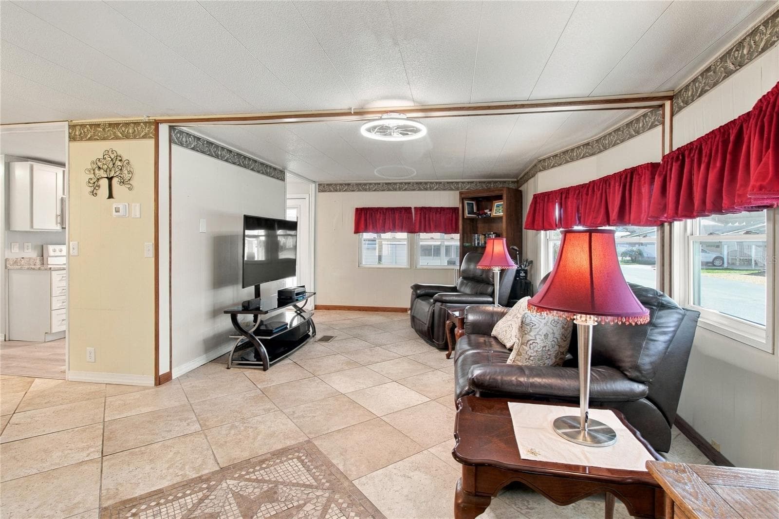 Living area care free flooring - 808 53RD AVE E #110, BRADENTON