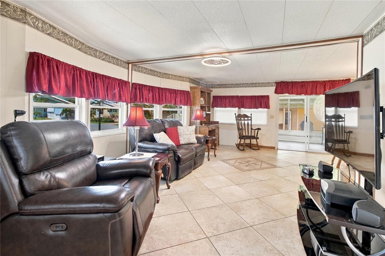 Living area - automatic shades in home - 808 53RD AVE E #110, BRADENTON