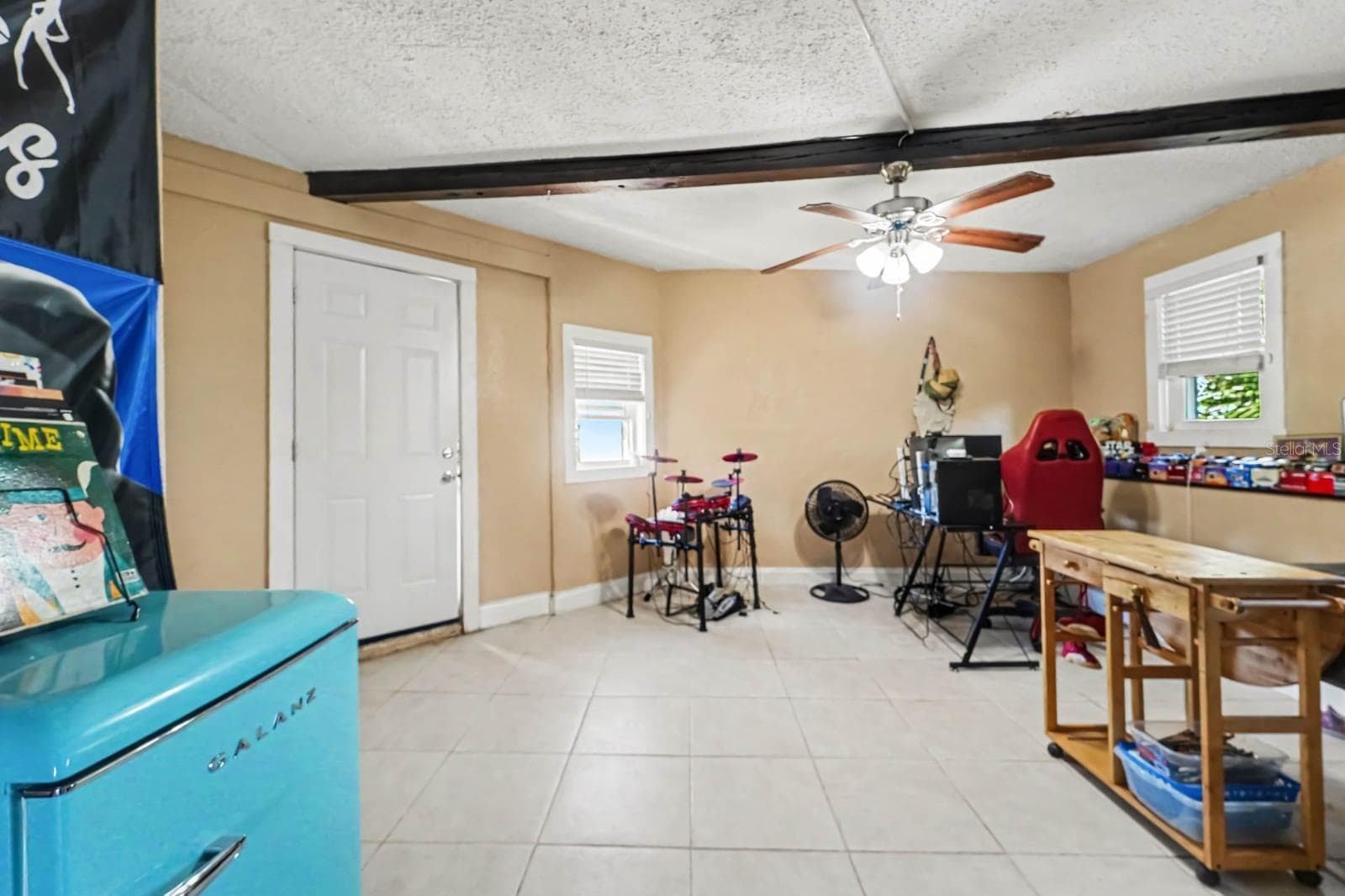 Versatile Recreation Room with Tile Flooring, Ceiling Fan & Multiple Windows - 1055 ENCOURTE GREEN, APOPKA