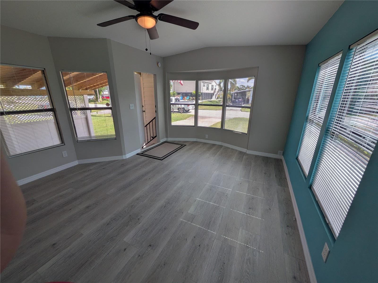 LIVING AREA FACING FRONT DOOR - 3125 BAYBERRY AVE, PUNTA GORDA