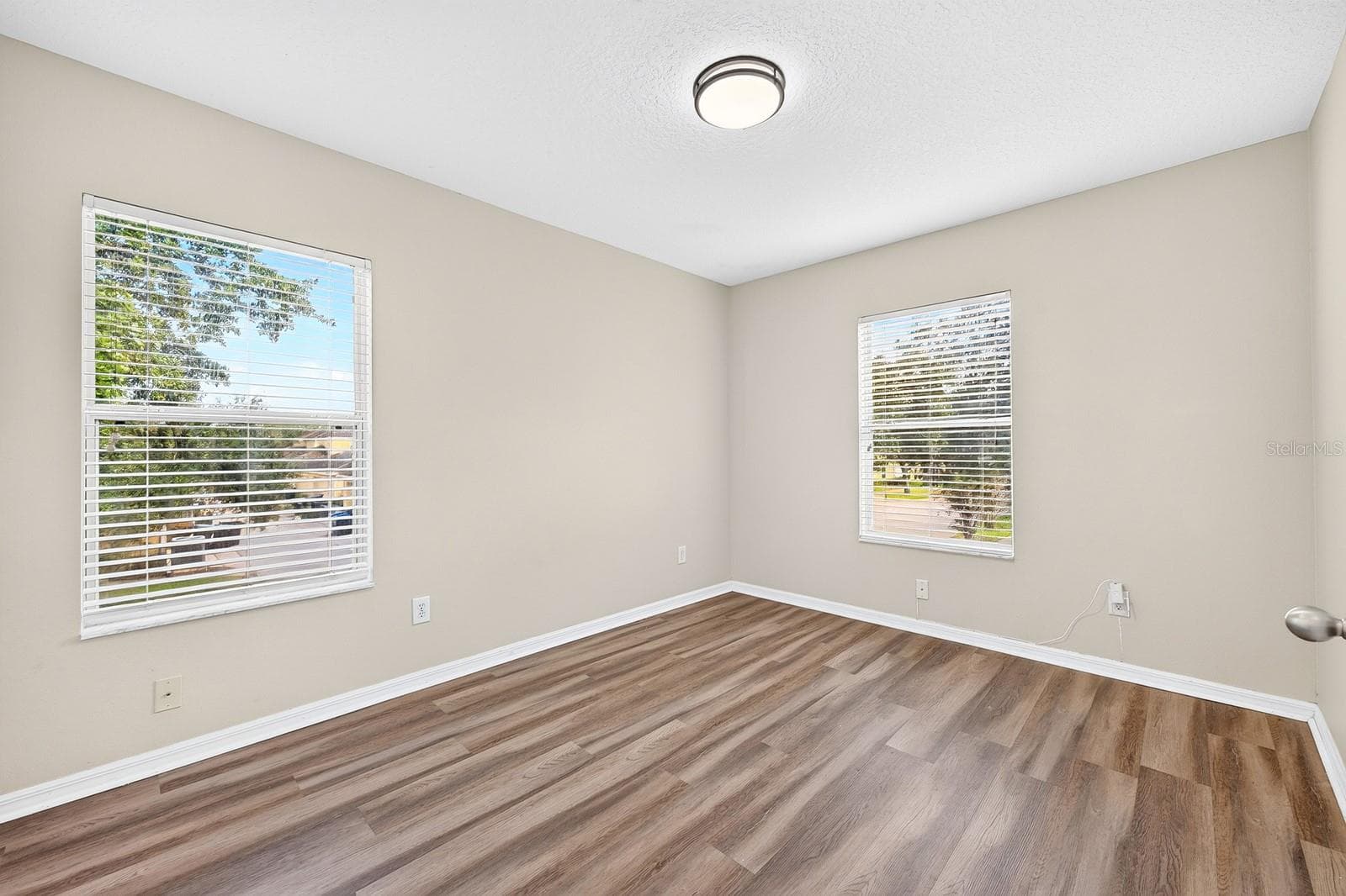 Perfectly sized, Bedroom 2 offers flexibility for use as a guest room, home office or hobby space. - 13028 AUBURN COVE LN, ORLANDO