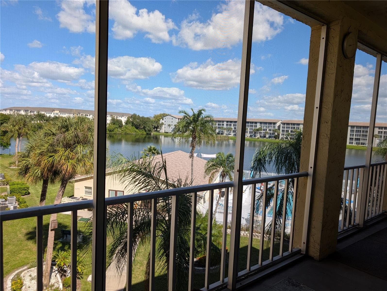 Lake, pool, clubhouse views... - 3779 LAKE BAYSHORE DR #H-402, BRADENTON
