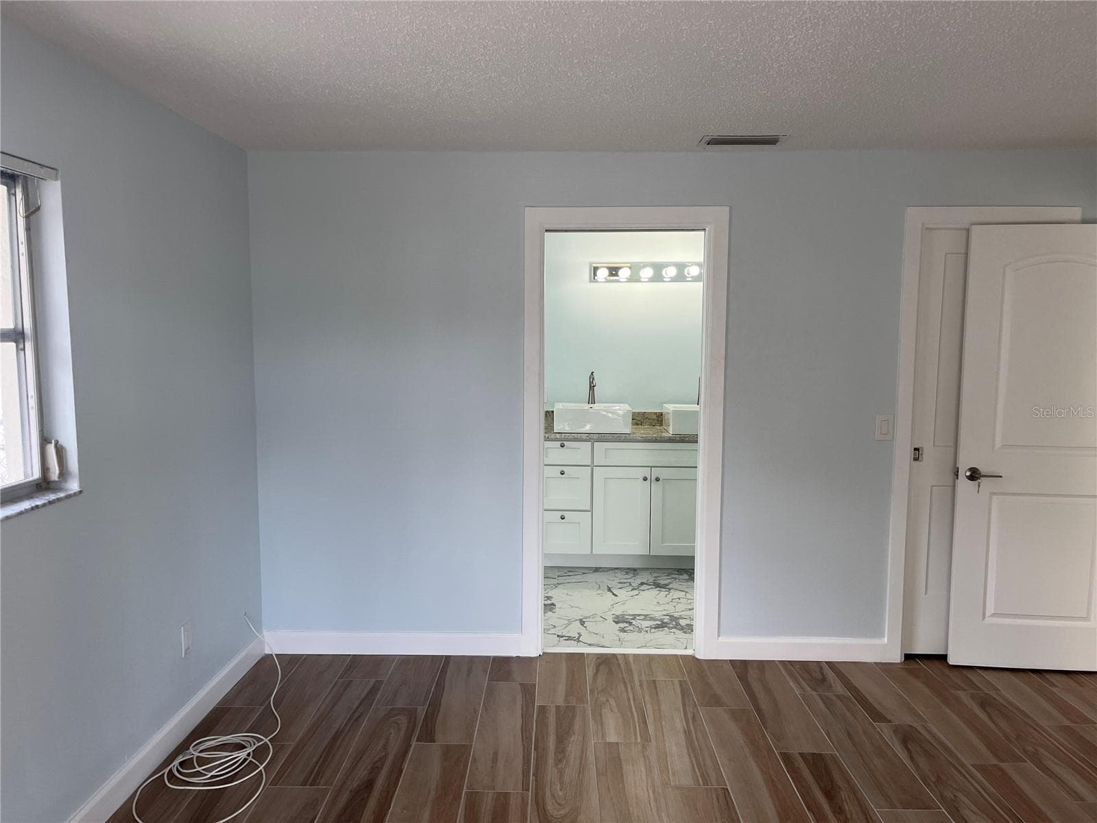 Primary with ensuite bathroom - 307 LA HACIENDA DR, INDIAN ROCKS BEACH