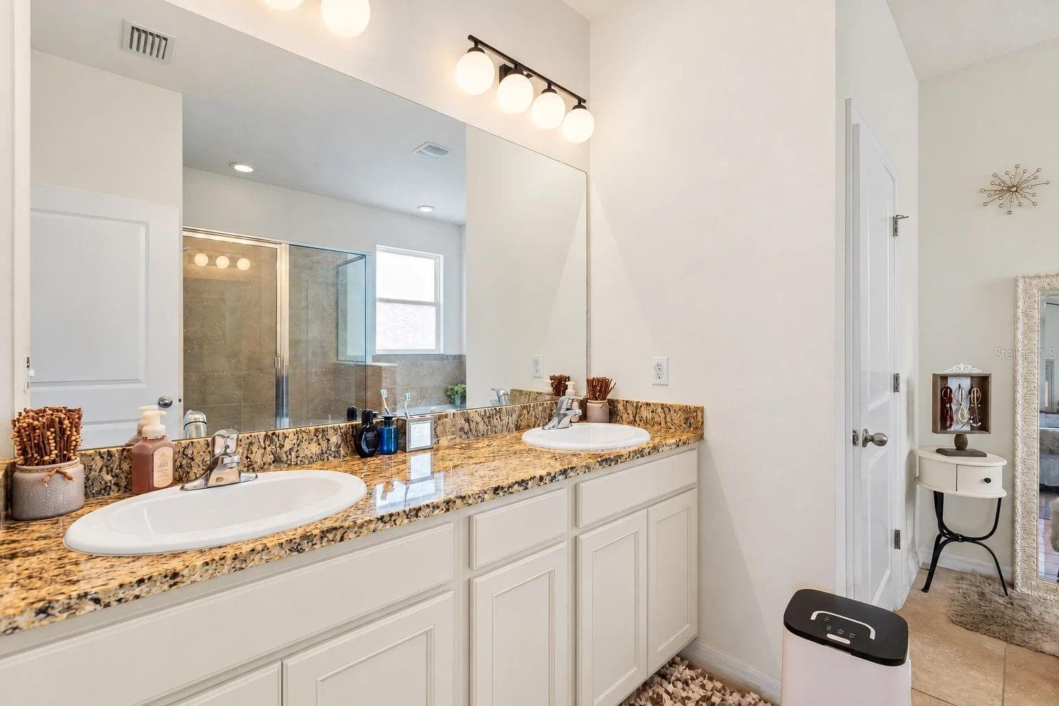 Modified picture to showcase a modern bathroom. Changes to cabinet/drawer color for disclosure purposes. - 5025 JACKEL CHASE DR, WIMAUMA