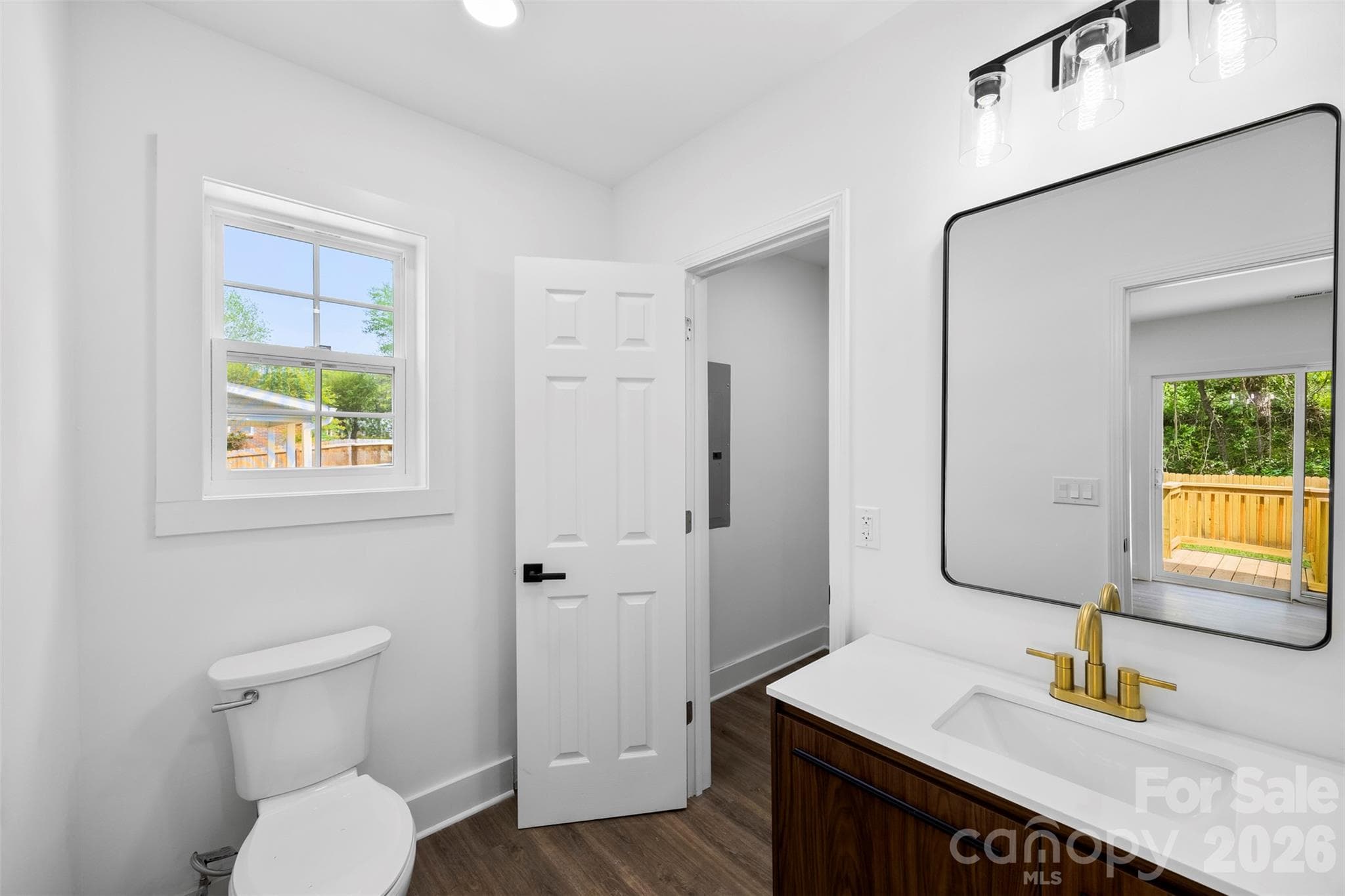 Primary bathroom with walk in closet. - 2942 Reid Avenue, Charlotte