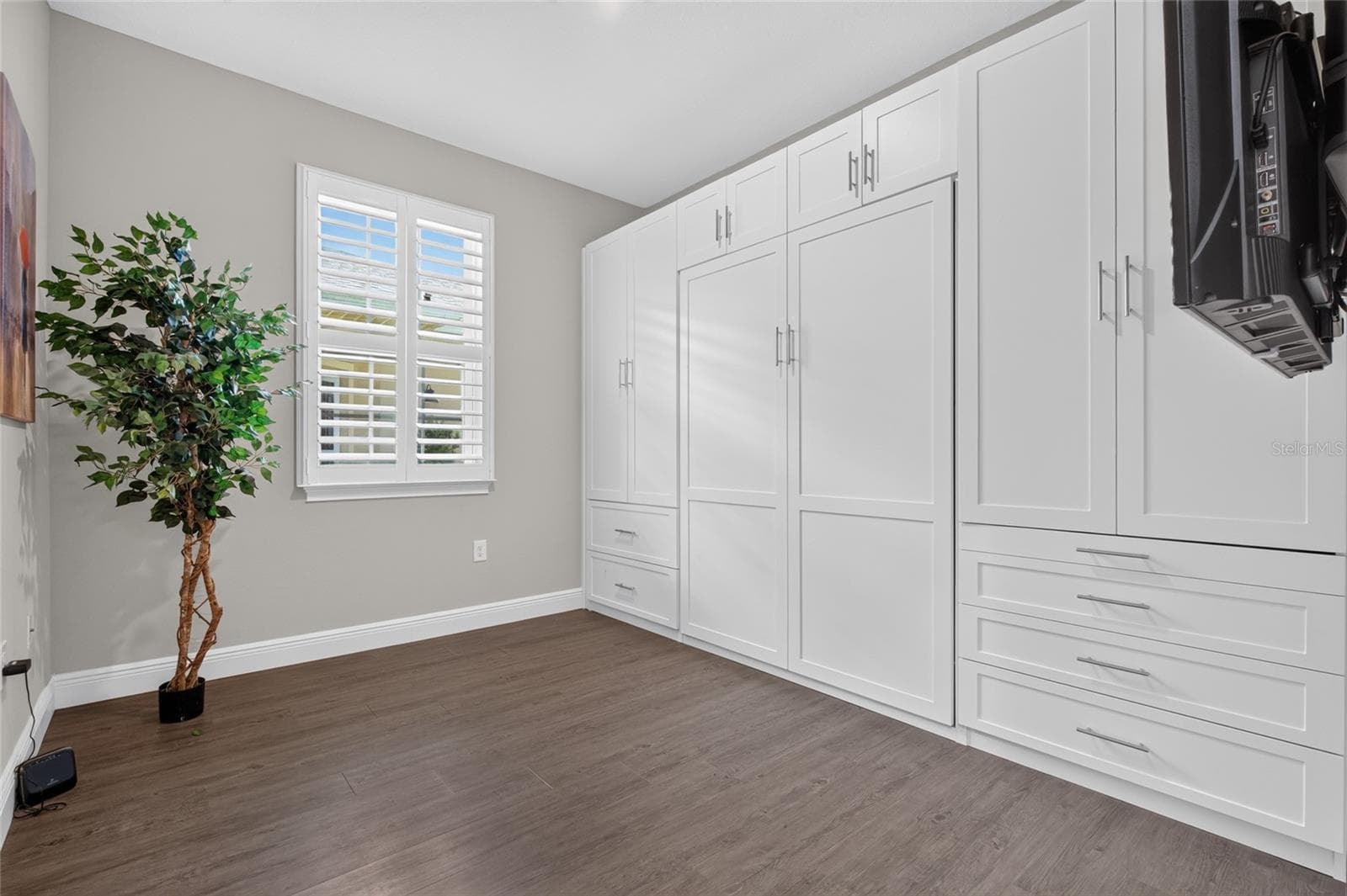 second bedroom. Murphy bed is available, custom cabinetry on right does not convey - 4408 BEDFORD WAY, LEESBURG