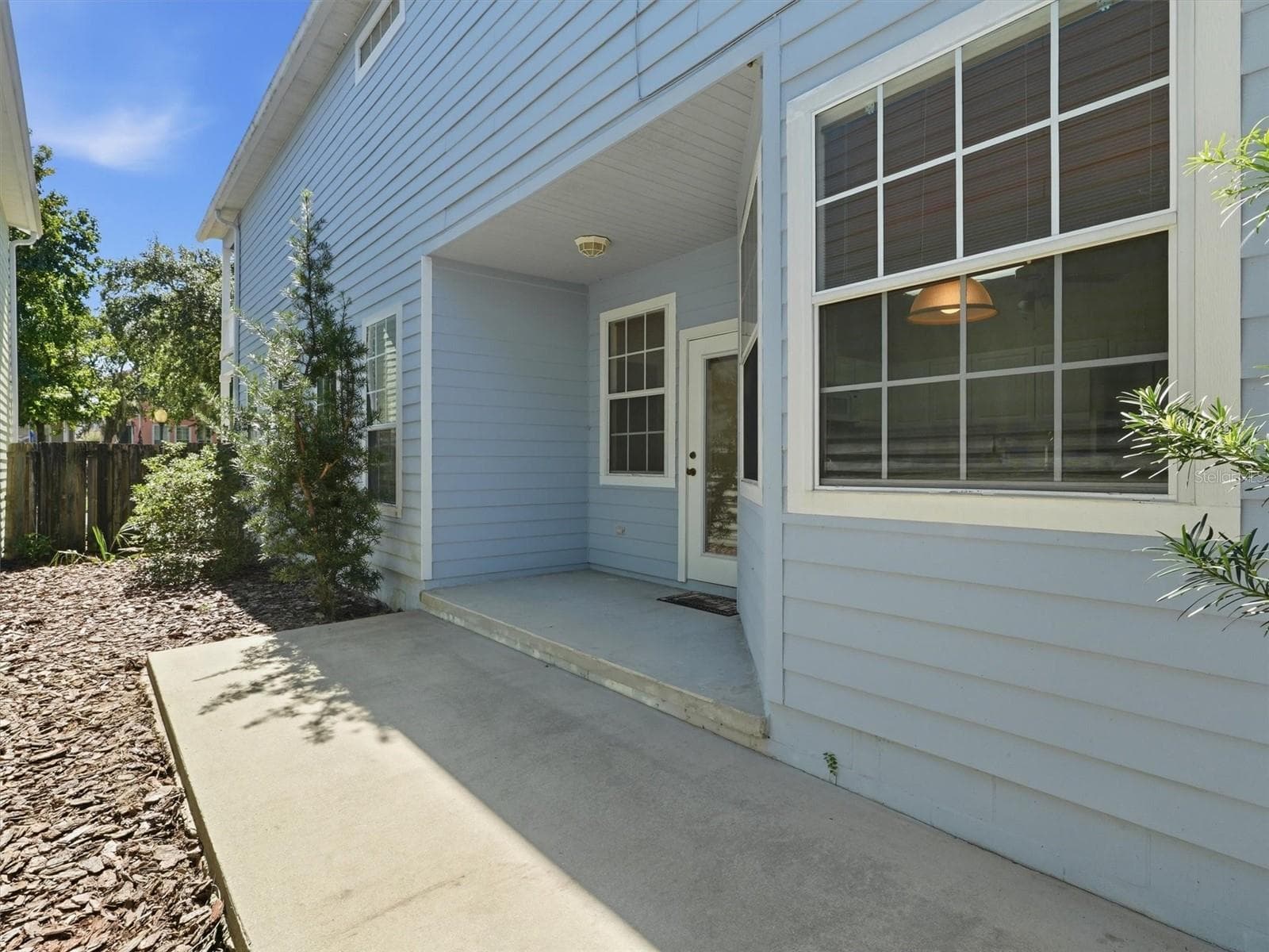 Patio off Kitchen & Dinette with Fenced Courtyard - 11644 NW 18TH PL, GAINESVILLE