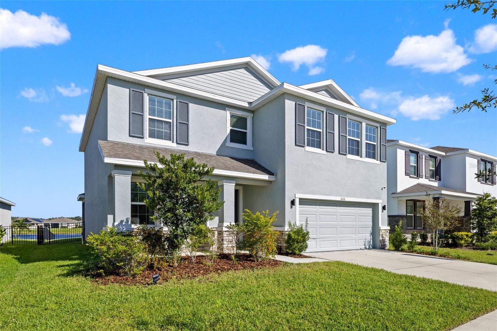 Front exterior left angle - 5126 Jackel Chase Dr, Wimauma - 5126 JACKEL CHASE DR, WIMAUMA