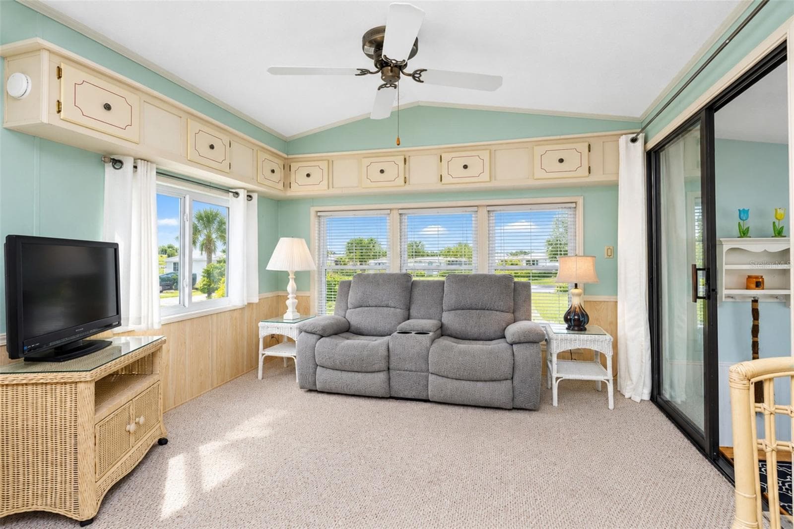 living room with tons of natural light - 39 CROWN POINT DR, NOKOMIS