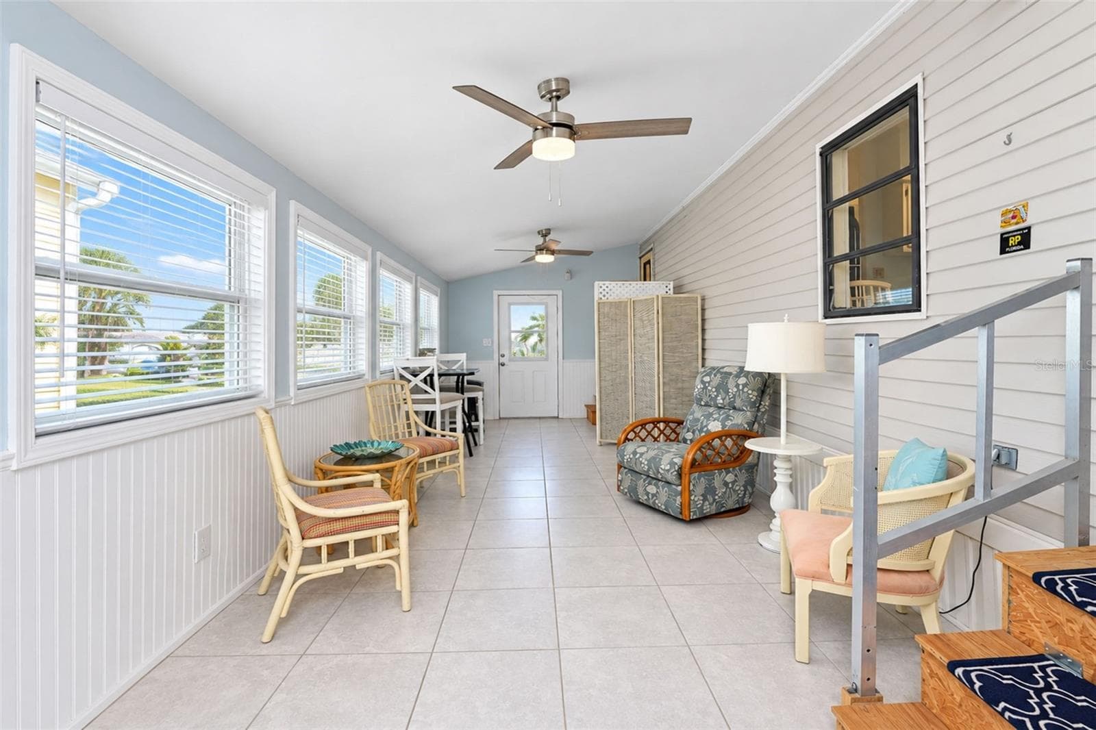 3 Season Room welcomes you with an abundance of windows - 39 CROWN POINT DR, NOKOMIS