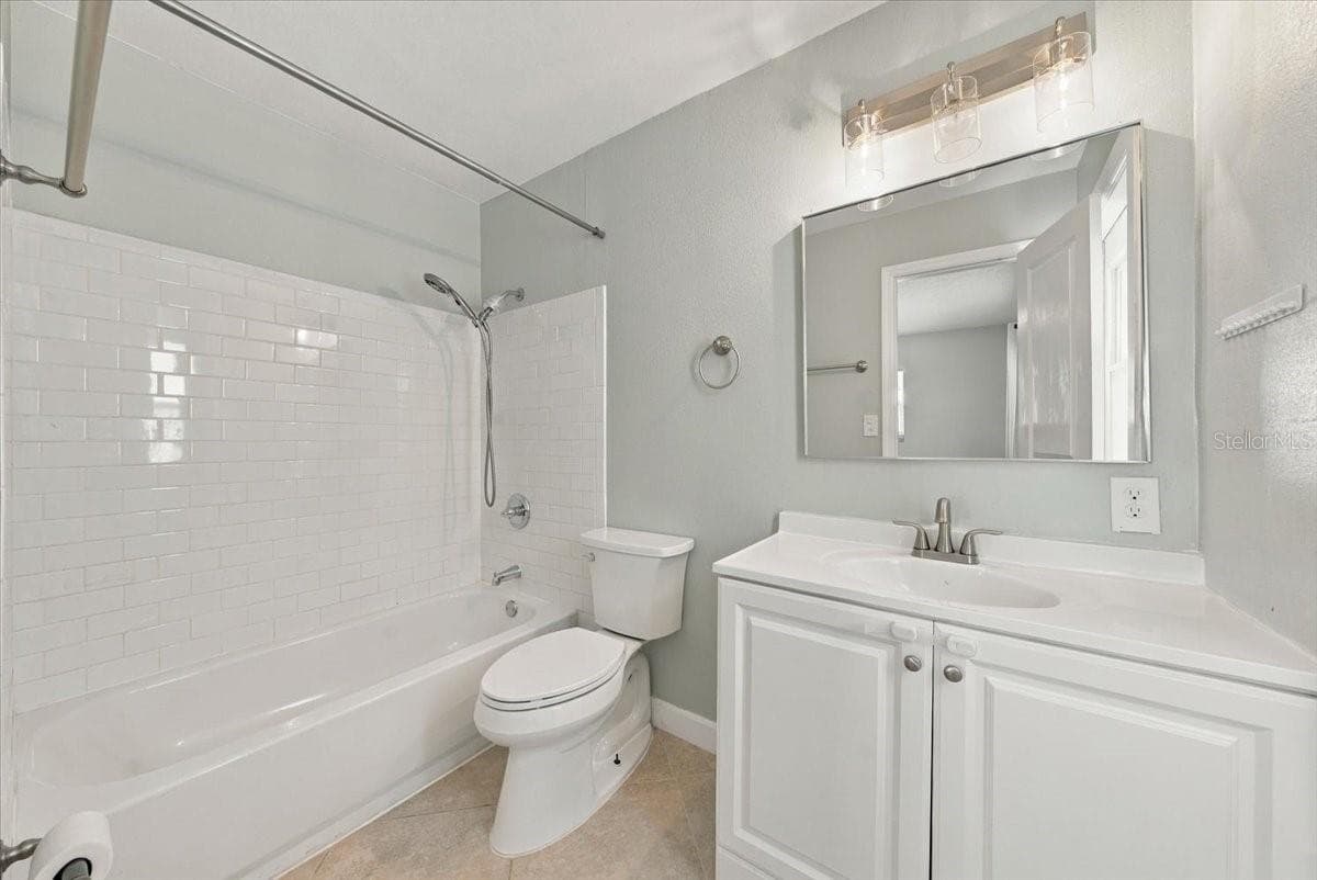 En suite bathroom - 5220 90TH TER N, PINELLAS PARK