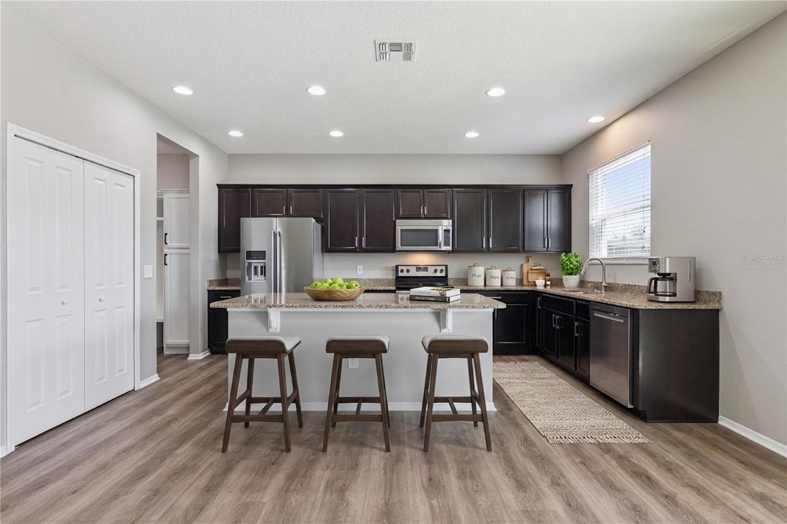 Virtually staged kitchen - 13612 LARANJA ST, CLERMONT