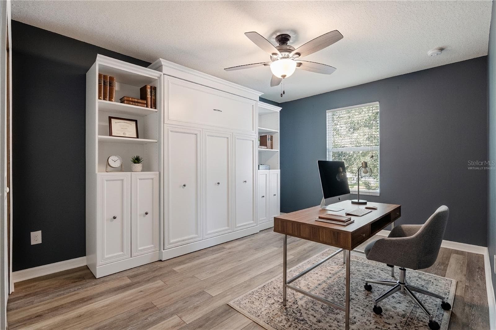 Virtually staged. Bedroom 4 with a murphy bed - 13612 LARANJA ST, CLERMONT