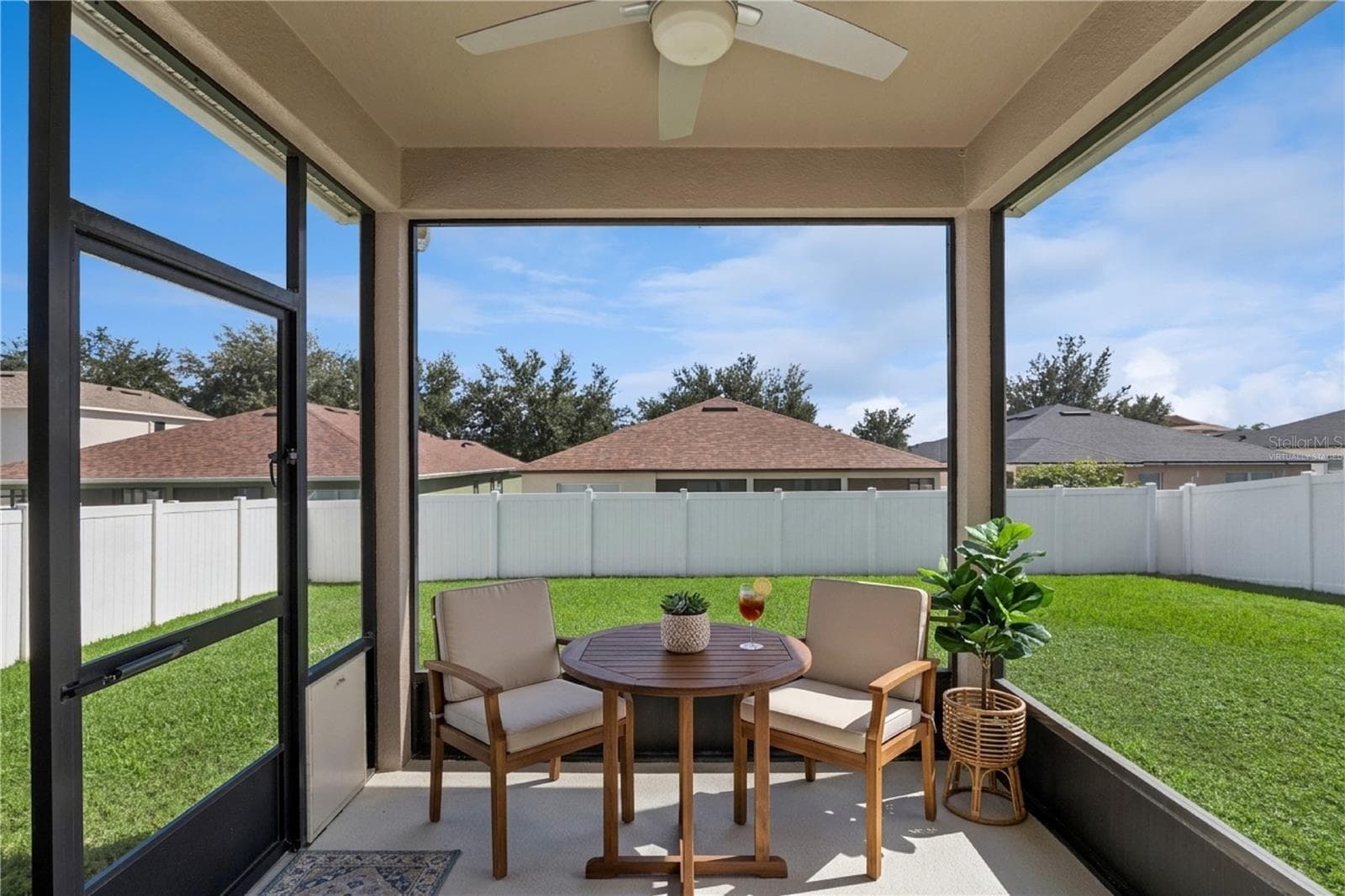 Virtually staged screened patio - 13612 LARANJA ST, CLERMONT