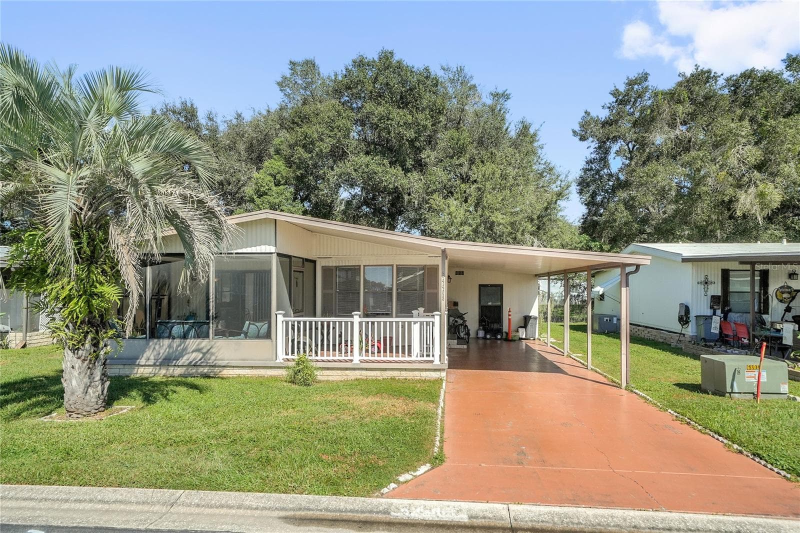 Manufactured Home at 34405 COUNTRYSIDE DR, WESLEY CHAPEL, photo 2 of 39