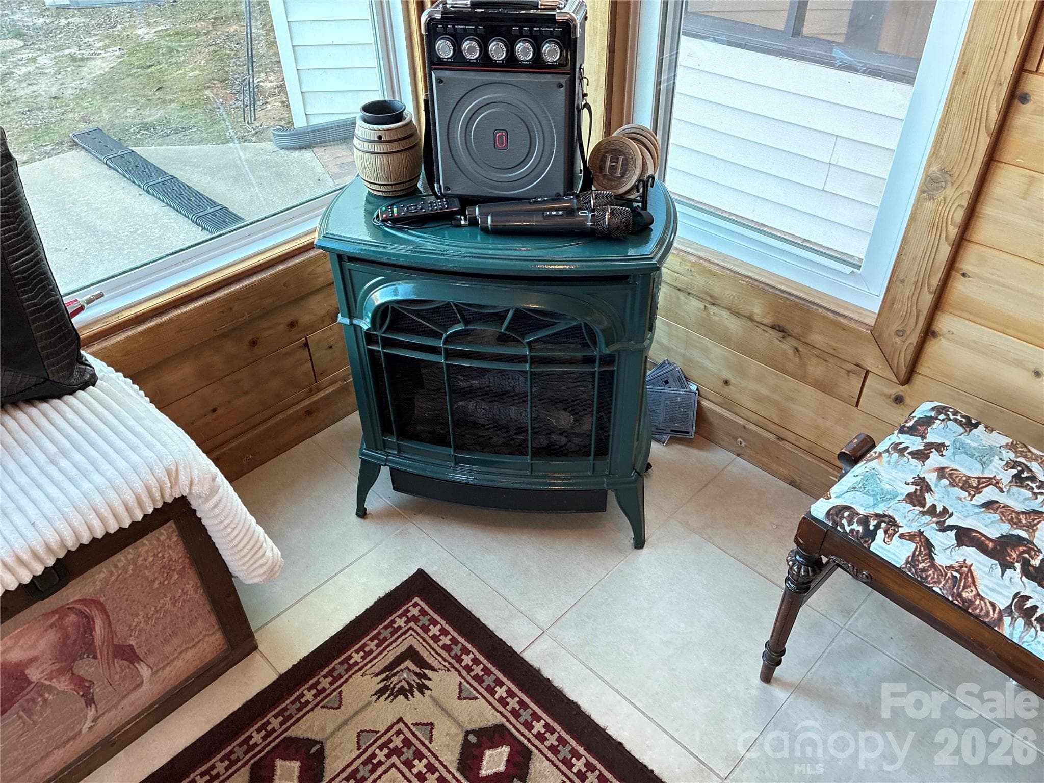 Gas stove in the sunroom - 902 Tomberlin Street, Monroe