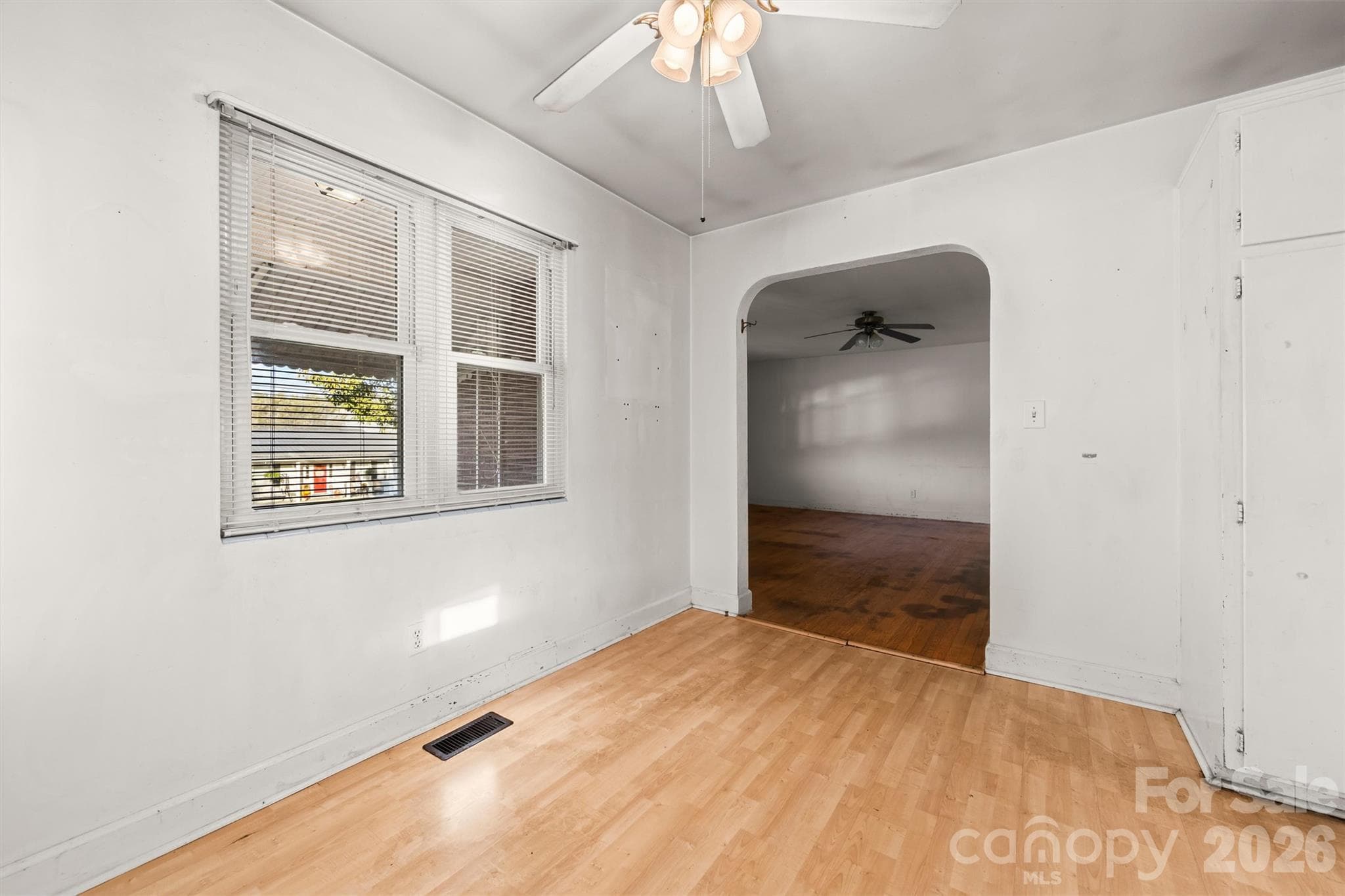 Dining area windows onto the porch and doorway to living room - 108 Morgan Street, Canton