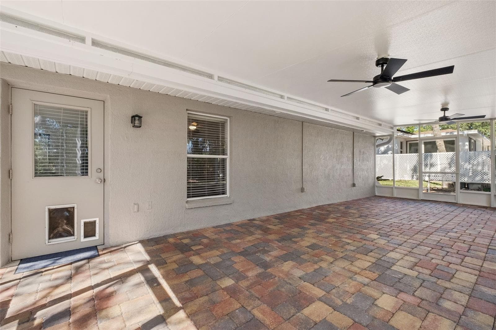 Expansive Screened Rear Porch with Pavers - 2138 FAIRVIEW RD, SPRING HILL