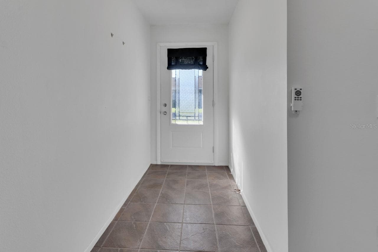 Condominium at 205 ELMWOOD AVE #220, DELAND, photo 9 of 27