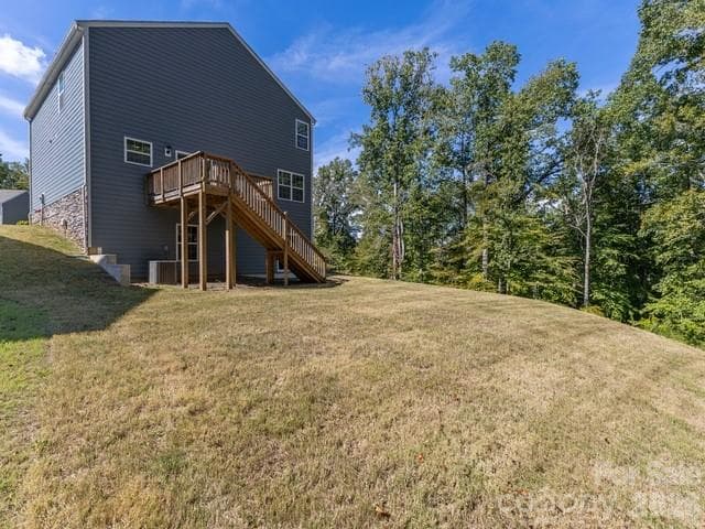 The private backyard boasts endless potential to create your ideal outdoor living and entertaining spaces, providing a serene, premium setting for gatherings, relaxation, and enjoying the outdoors. - 3741 Stanley Creek Drive, Mount Holly