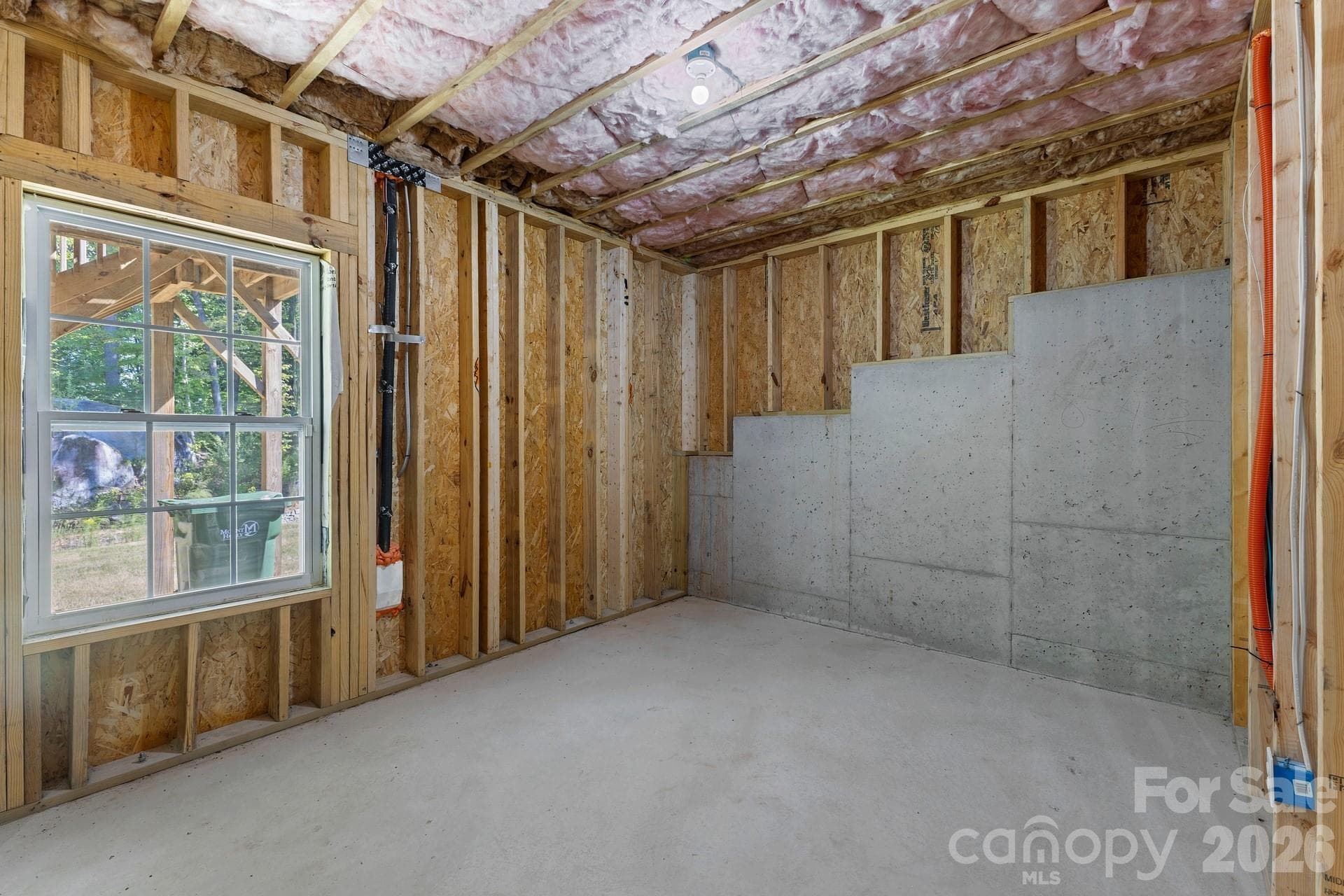 Framed unfinished bedroom located in the basement. - 3741 Stanley Creek Drive, Mount Holly