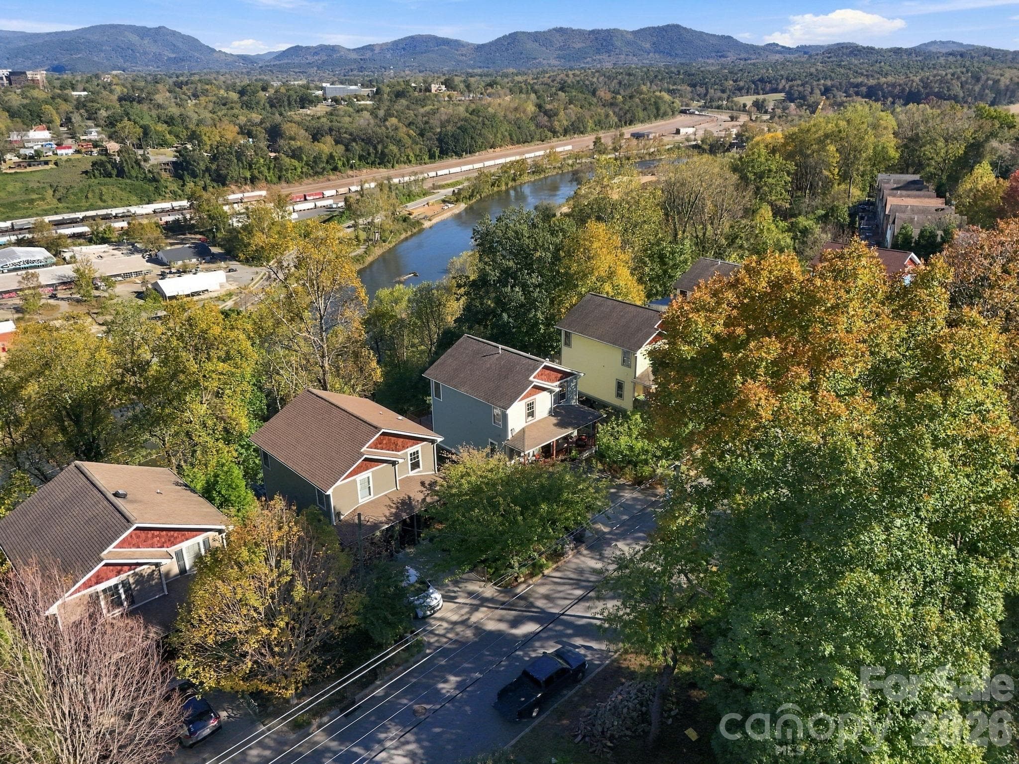 3rd from the Left (front of the house ~ river is well below the home and the home is not located in any kind of floodplain) - 272 Riverview Drive, Asheville