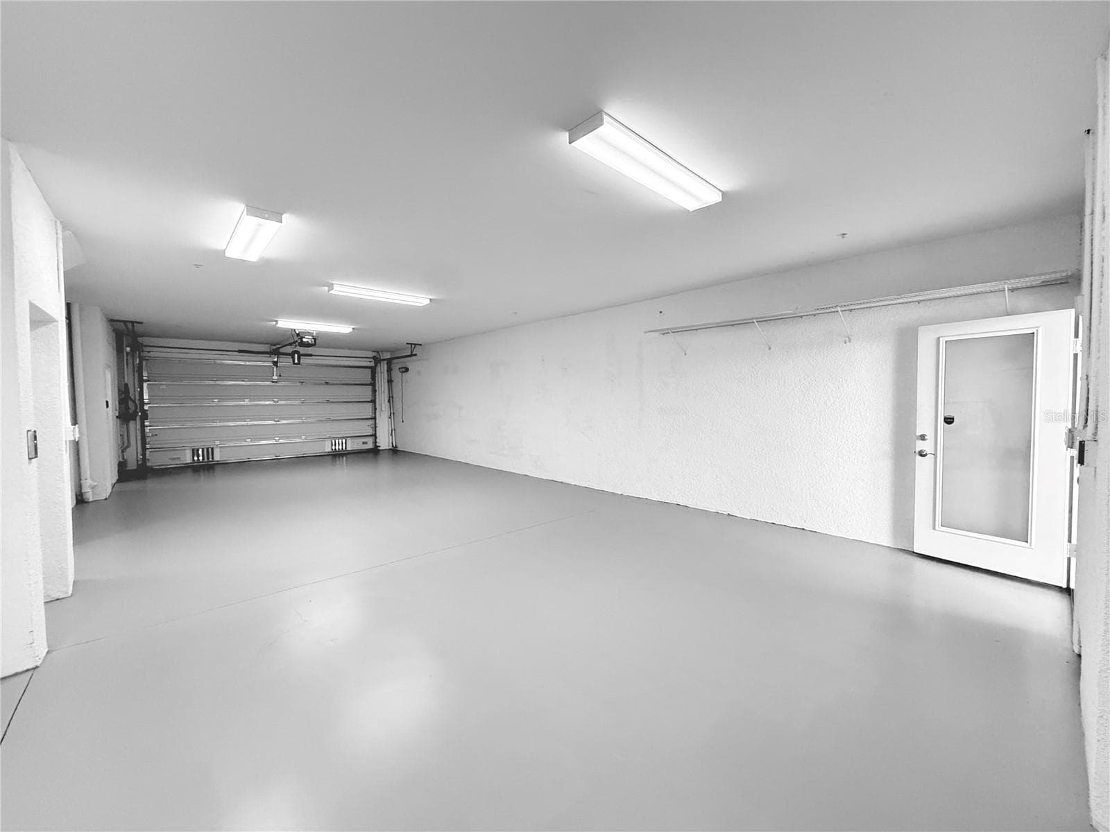 4 car garage with workshop space!! Rear screened patio just off of it! - 10320 LANDS END CIR #47, PLACIDA