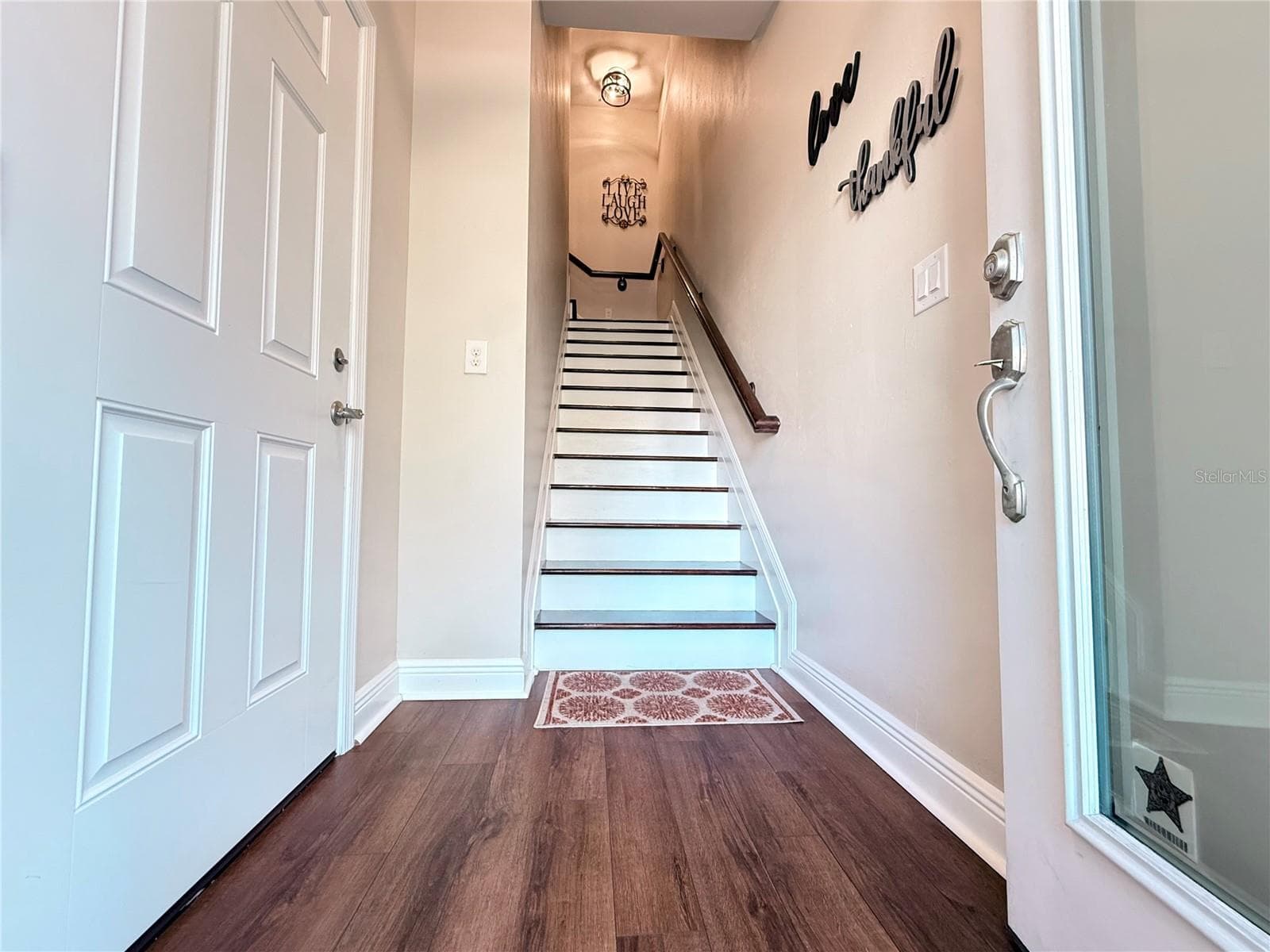 Entry into the front door, garage door entry on the left. - 10320 LANDS END CIR #47, PLACIDA