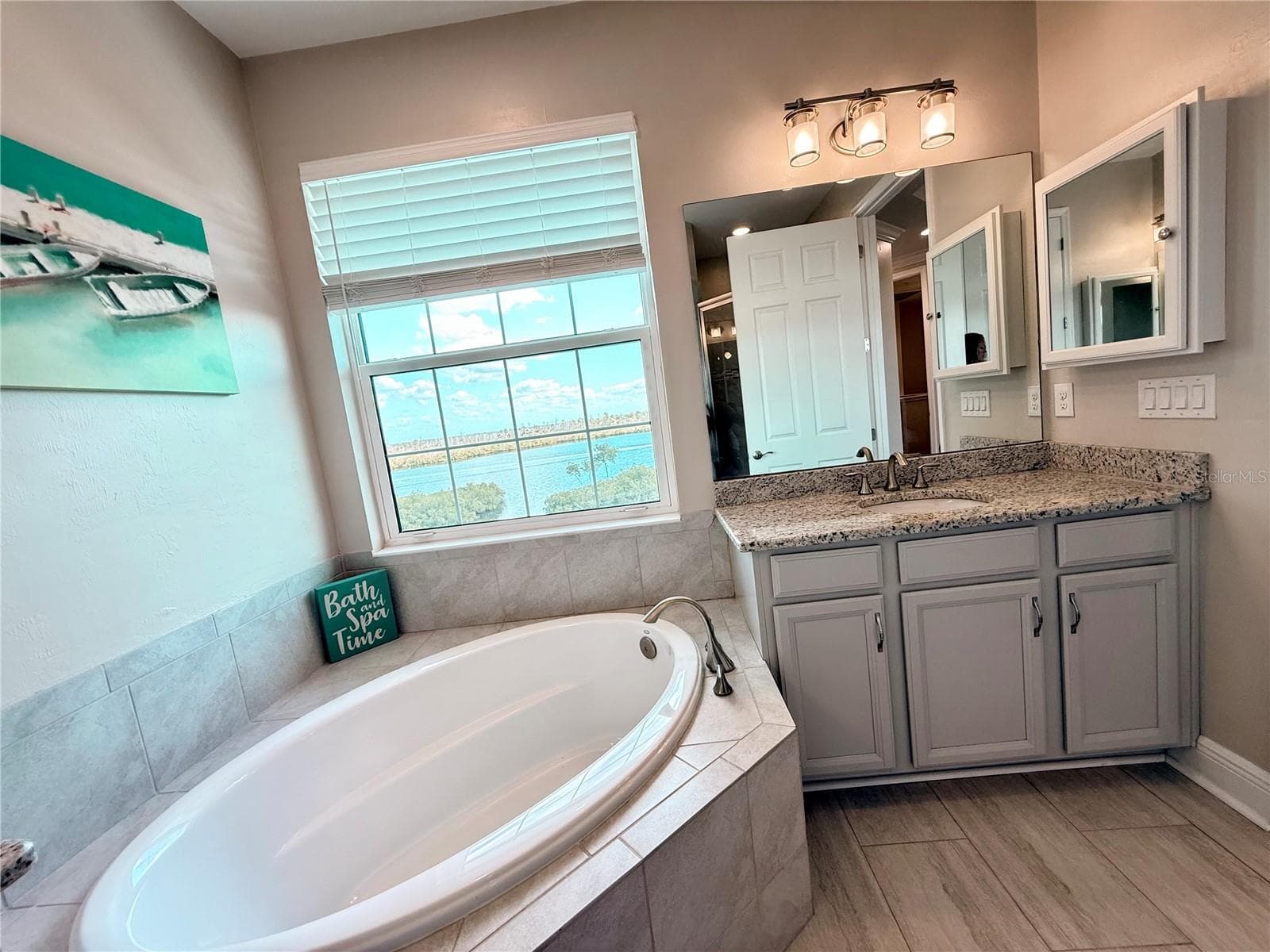 Gorgeous water views from the soaking tub! - 10320 LANDS END CIR #47, PLACIDA