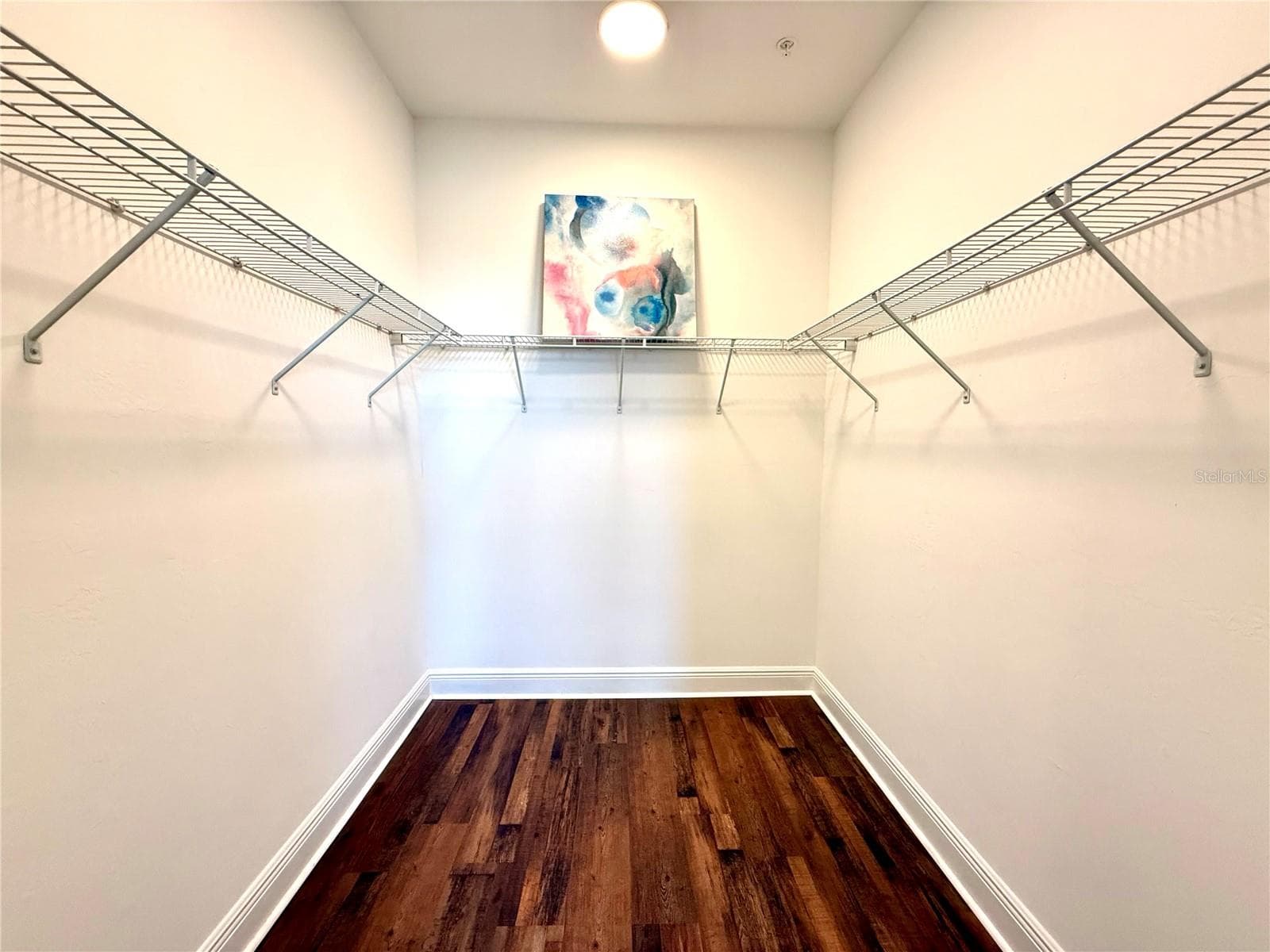 Walk-in closet in primary bedroom #3 - 10320 LANDS END CIR #47, PLACIDA