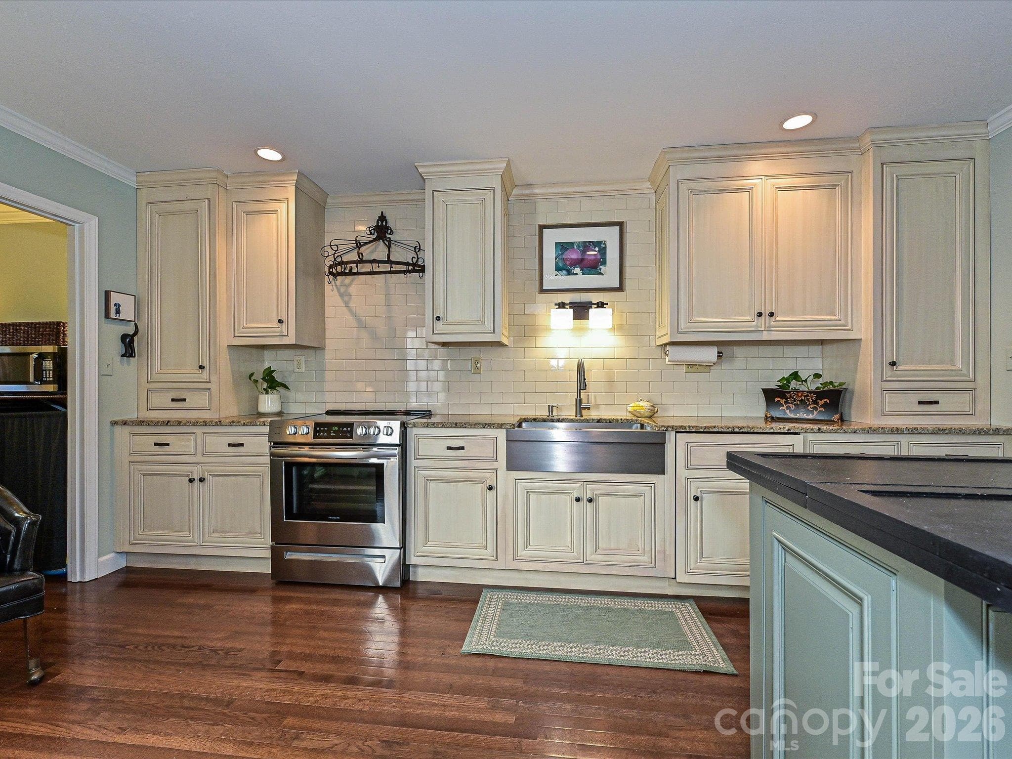 Newer stove and stainless farmhouse sink - 4313 Silo Lane, Charlotte