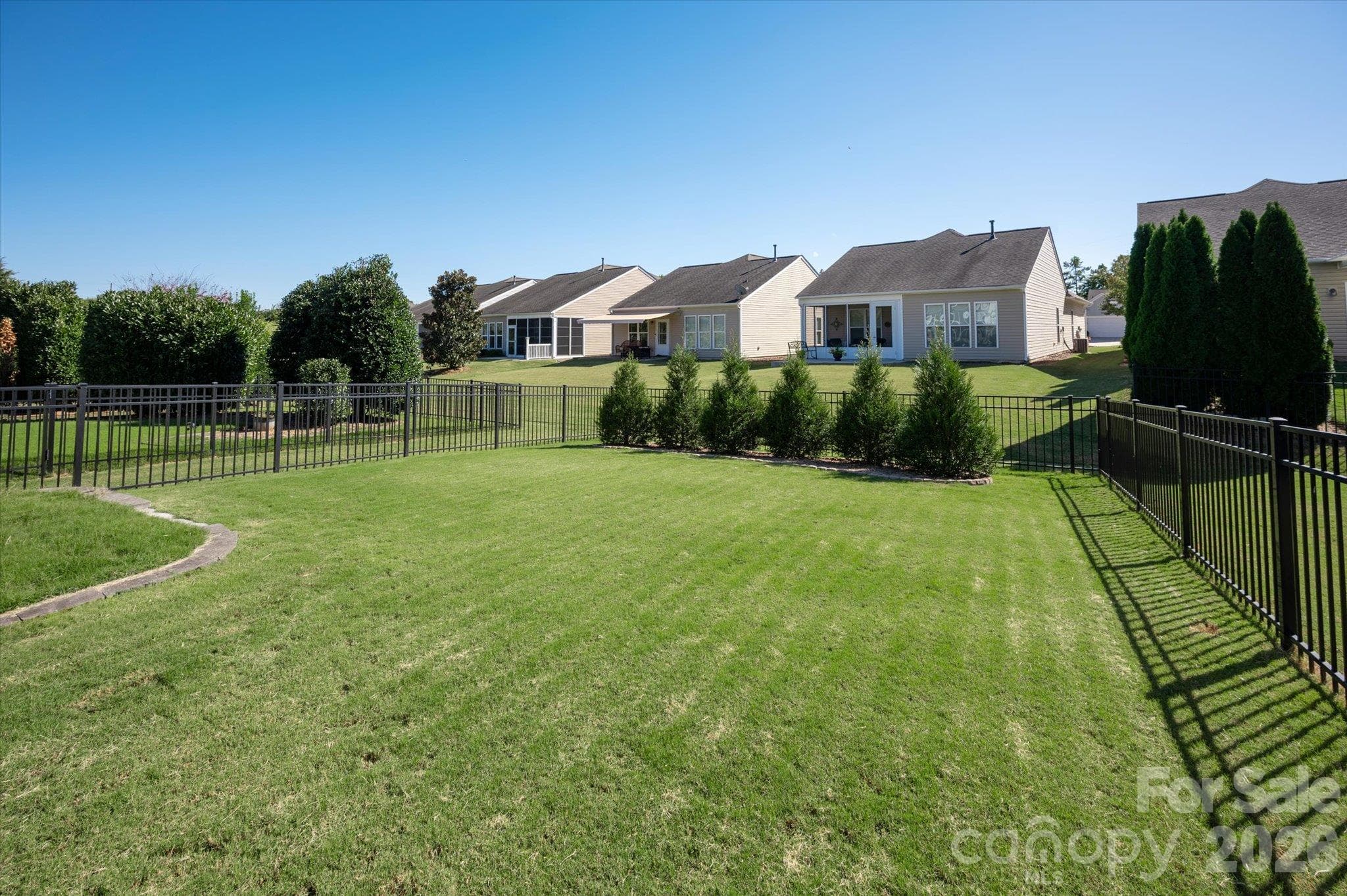 Fully FENCED yard with privacy trees that are still growing! - 23121 Whimbrel Circle, Indian Land