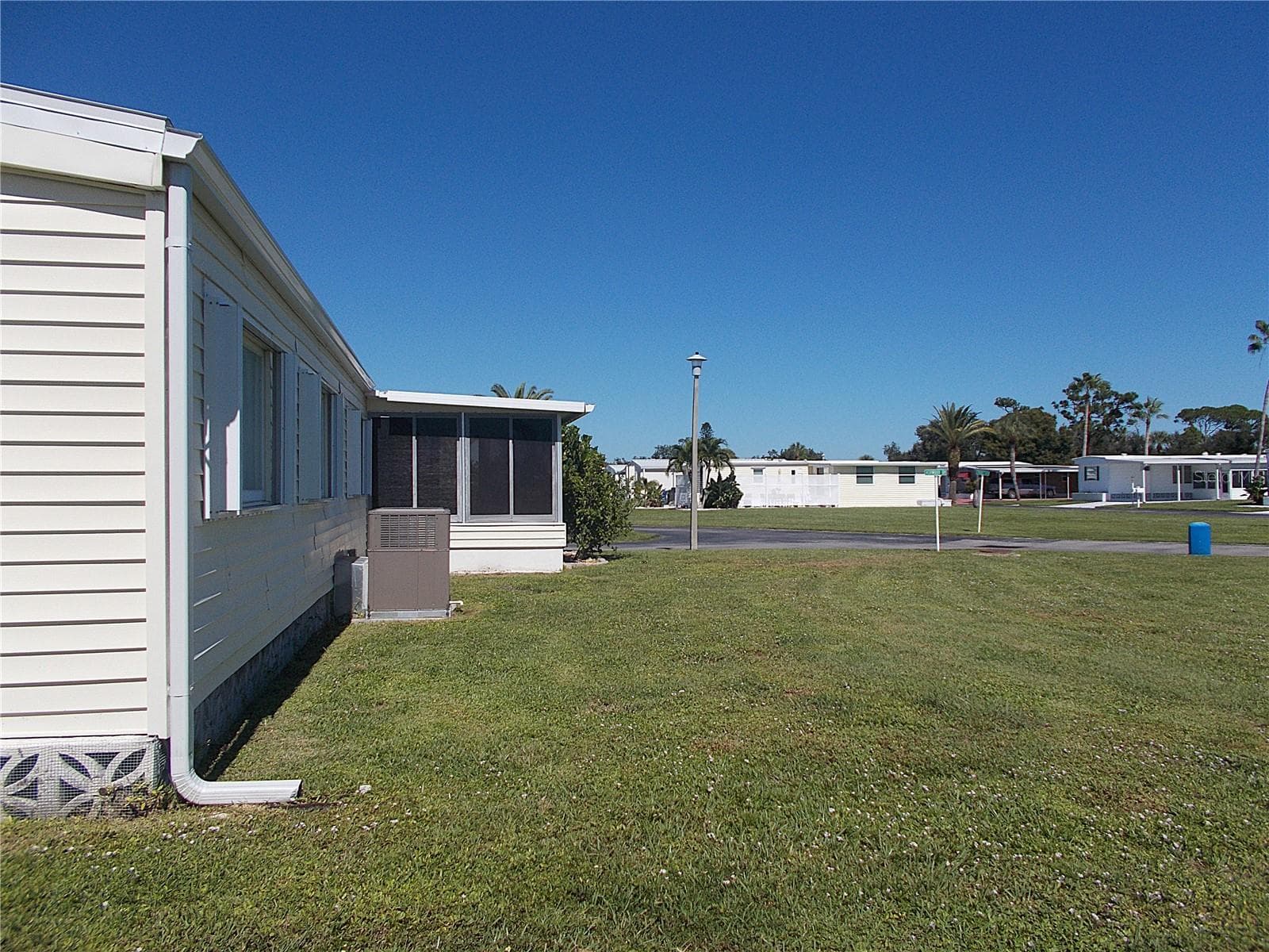 Corner lot vantage from rear of home - 490 ASHWOOD DR, VENICE