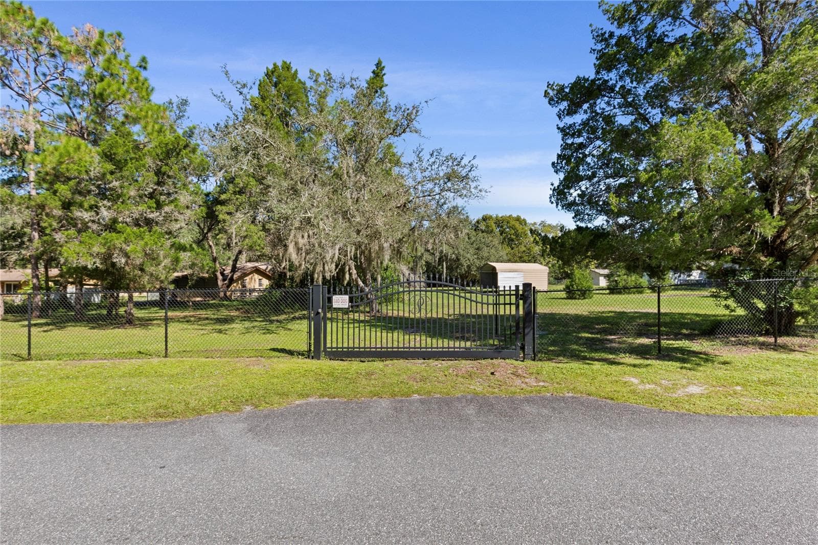 Gated Entrance for adjacent lot - 10179 FRIERSON LAKE DR, HUDSON