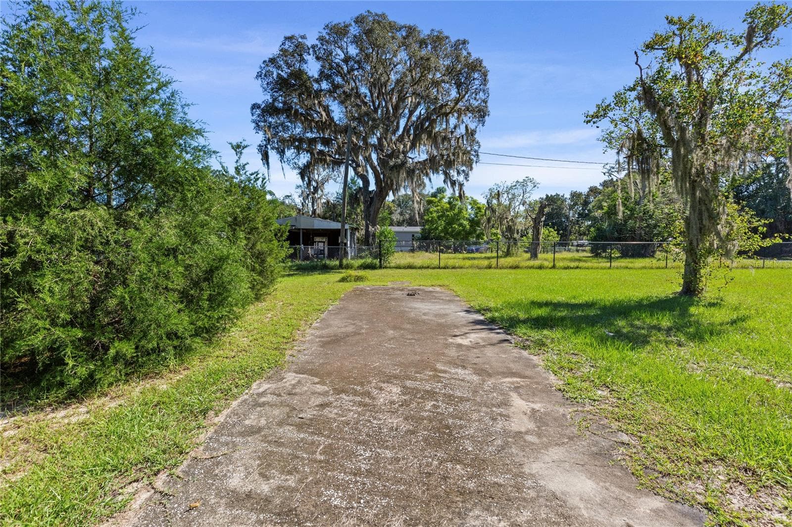 Concrete pad on adjacent lot - 10179 FRIERSON LAKE DR, HUDSON