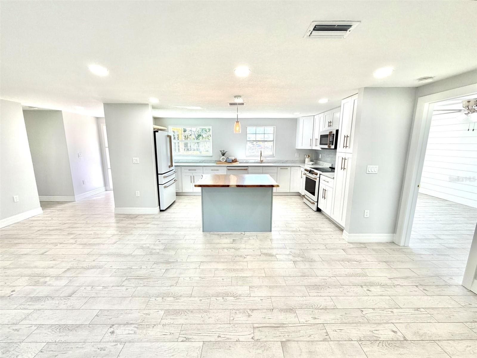 All new tile flooring throughout the home! - 336 SHADDOCK ST, TARPON SPRINGS