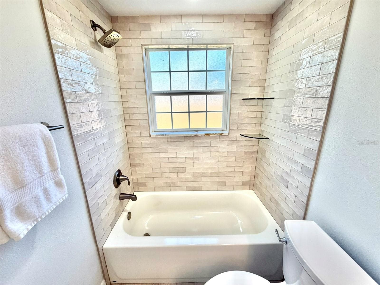Glazed Tile in the third full bath - 336 SHADDOCK ST, TARPON SPRINGS