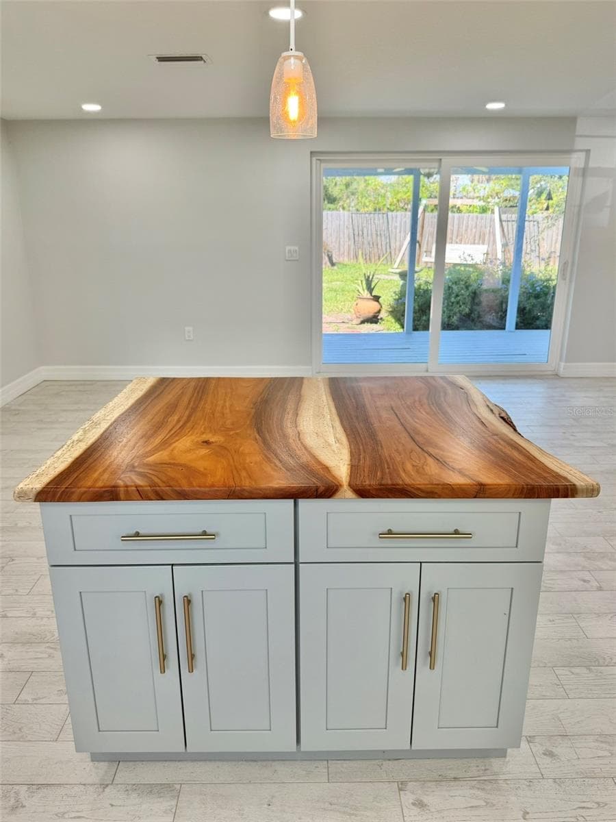 Custom Island with Locally made Live Edge Countertop - 336 SHADDOCK ST, TARPON SPRINGS