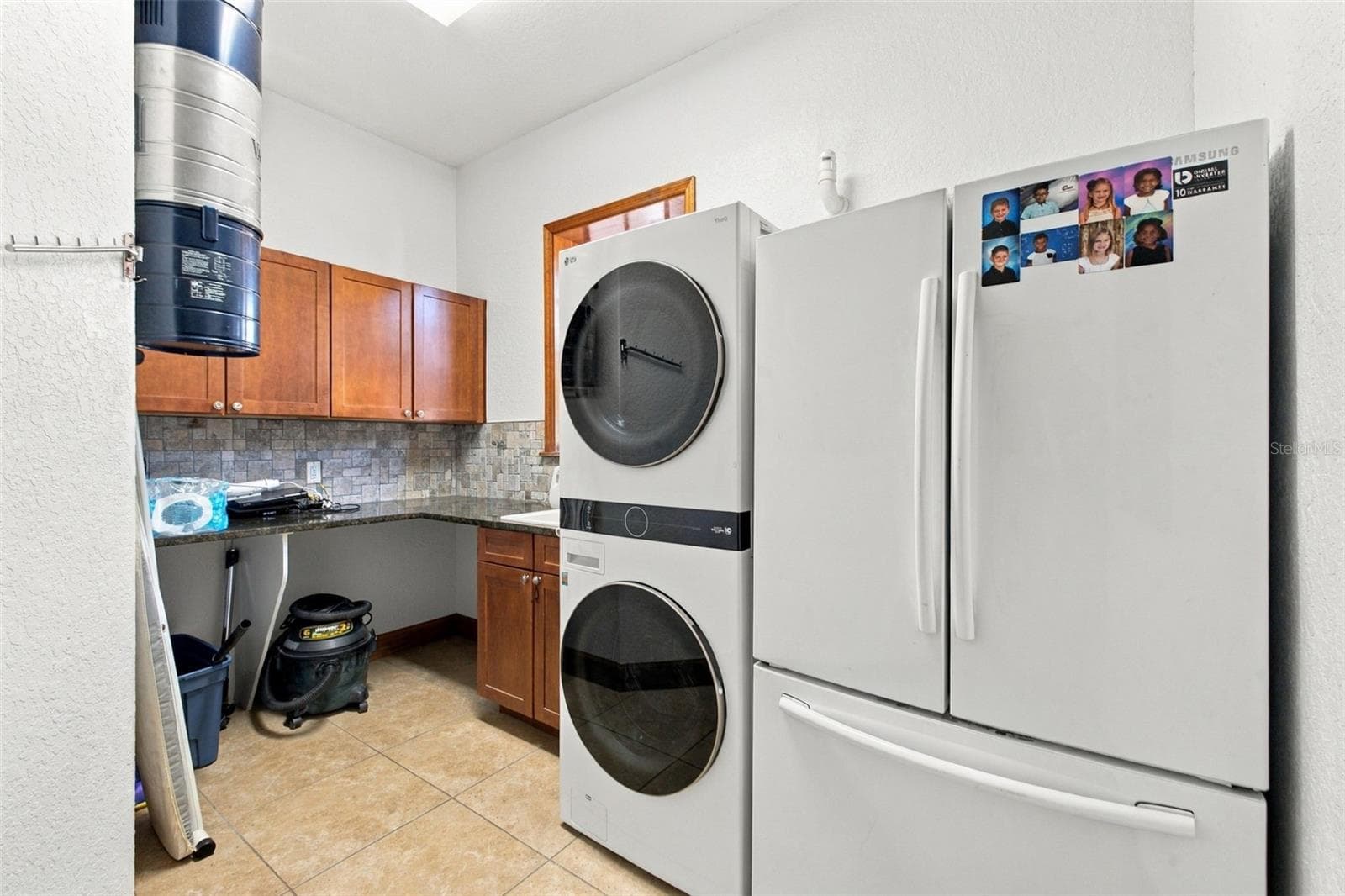 DOWNSTAIRS UTILITY ROOM - 10484 GYPSY AVE, WEEKI WACHEE
