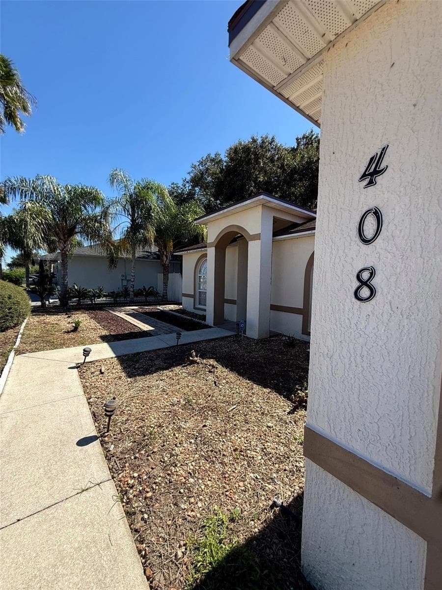 Single Family Residence at 408 CARDINAL CT, POINCIANA, photo 2 of 14