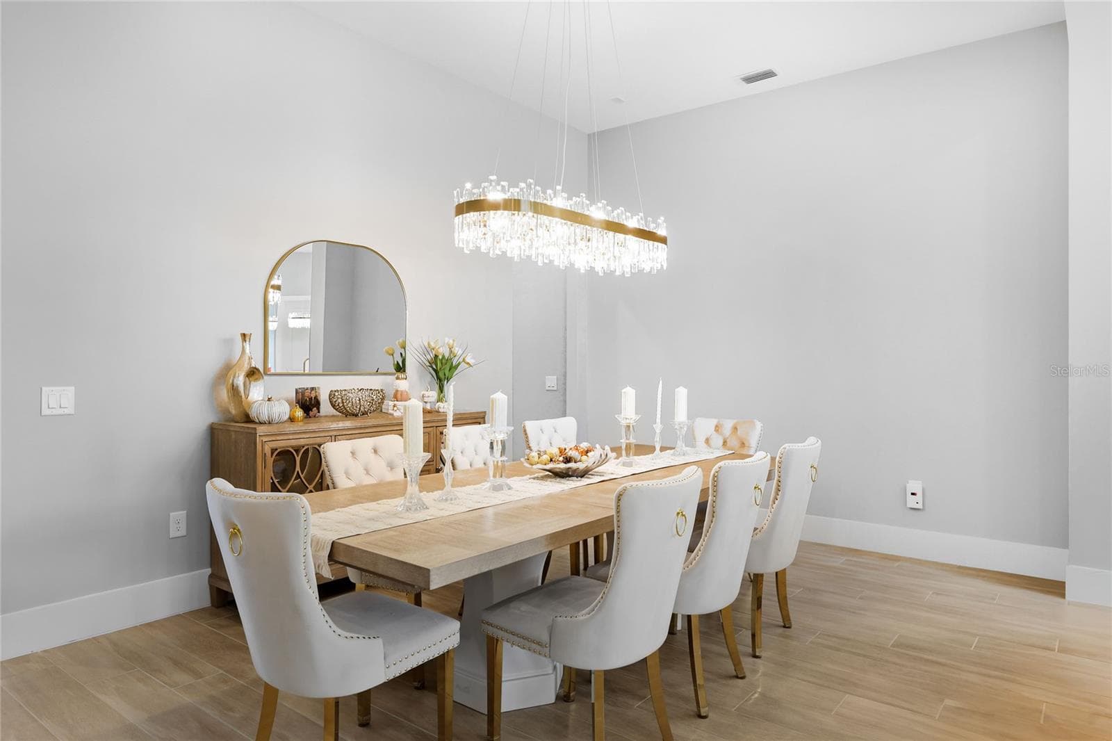 Spacious, elegant Dining Room with beautiful fixtures. - 14726 EAGLE BRANCH DR, NOKOMIS