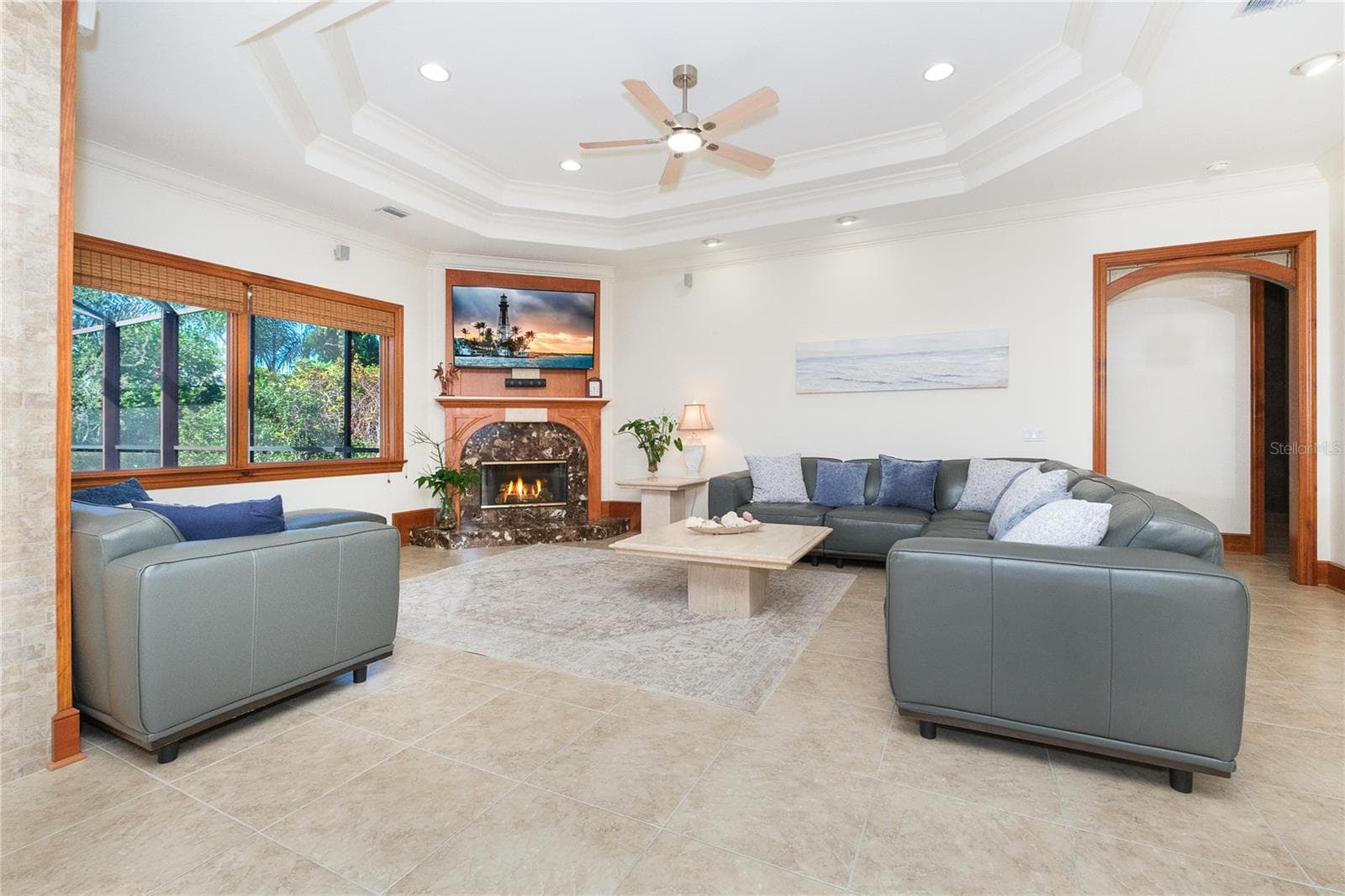 Family Room is complimented by a wood burning fireplace - 1930 BAYSHORE DR, ENGLEWOOD