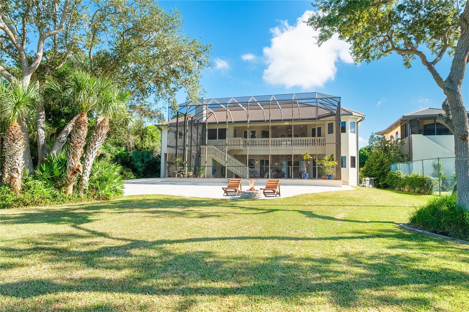 Firepit and seating area (virtually staged) - 1930 BAYSHORE DR, ENGLEWOOD