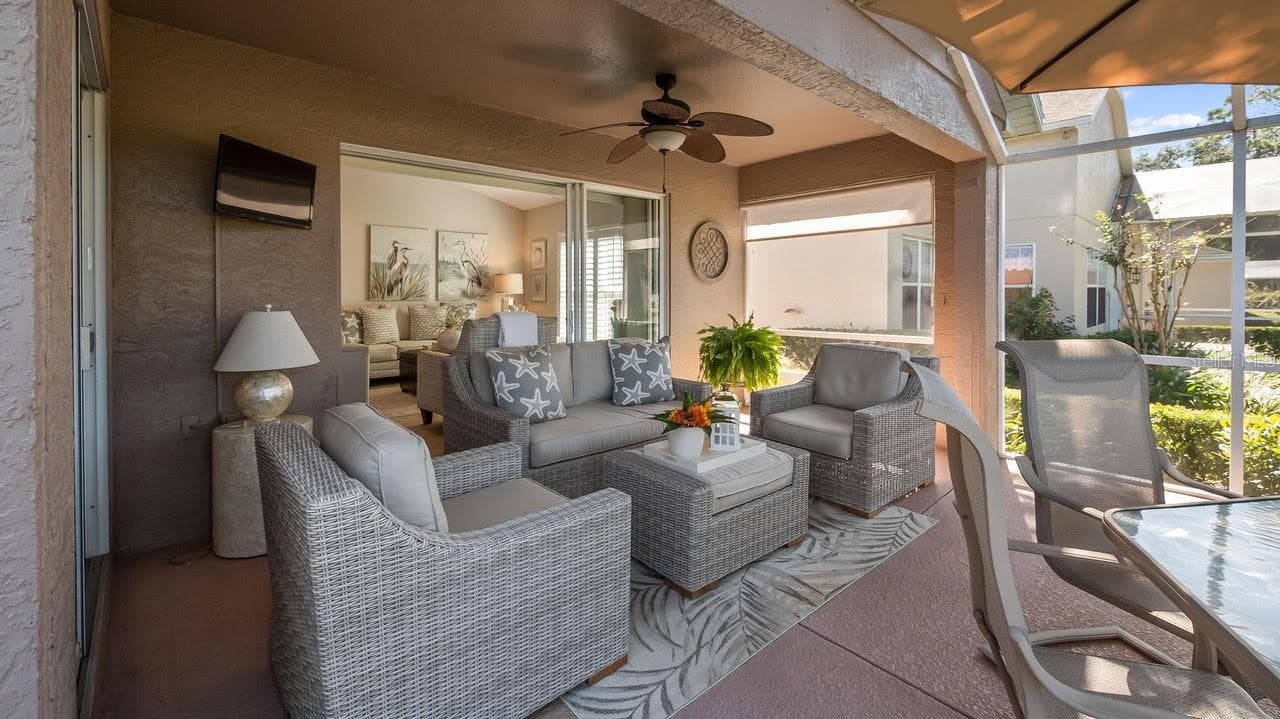 Relaxing Area on the Lanai Overlooking the Golf Course - 3720 DOUNE WAY, CLERMONT