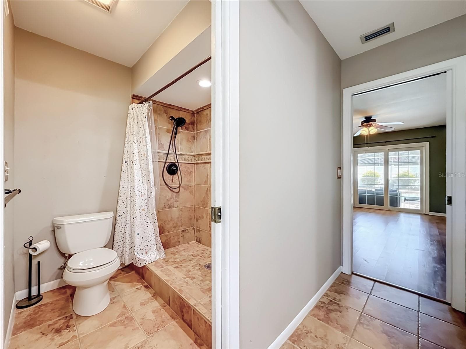 Walk in shower & view to primary BR - 3120 SWAN LN, SAFETY HARBOR