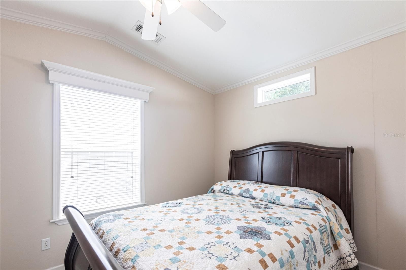 Bedroom with windows and ceiling fan - 1329 TROUT, PUNTA GORDA