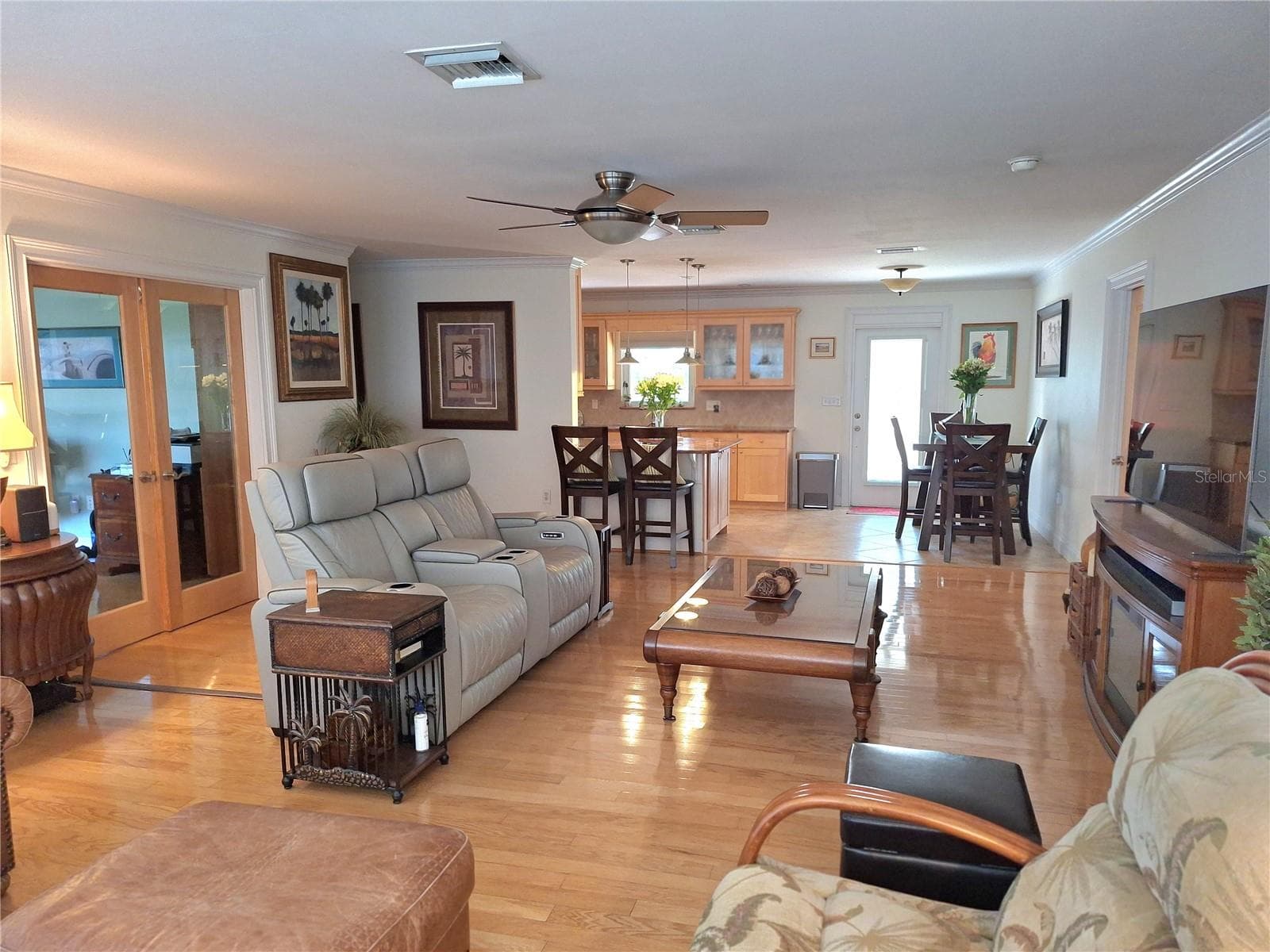 Great Room with glass doors leading into the office/den. - 456 W 10TH AVE, MOUNT DORA