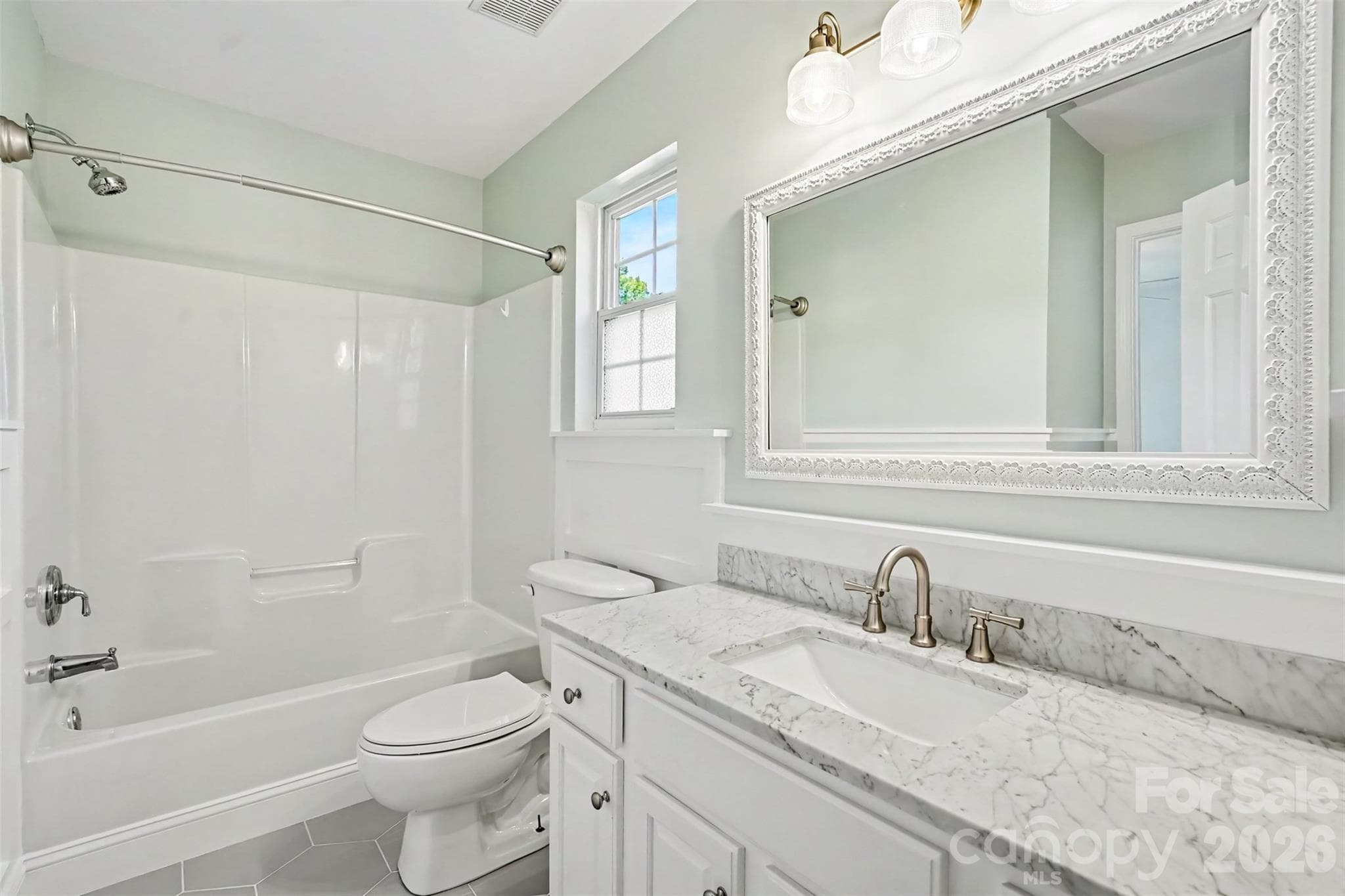 Jack and Jill bath with updates! Nice trim work, counter tops. - 4104 Bamborough Drive, Fort Mill
