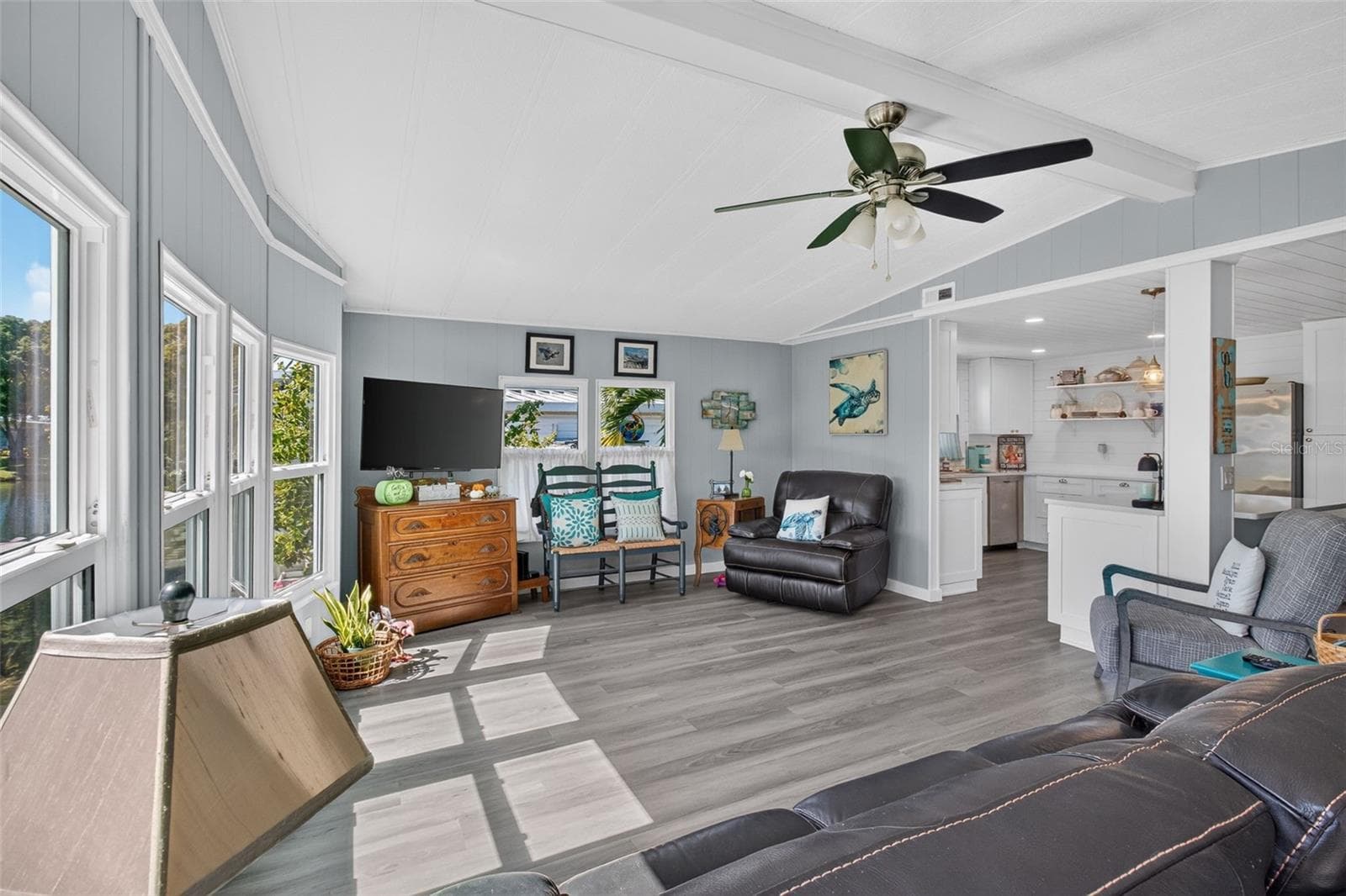 Open floor plan living room, kitchen, dining. - 176 CLUBVIEW DR #3, SAFETY HARBOR