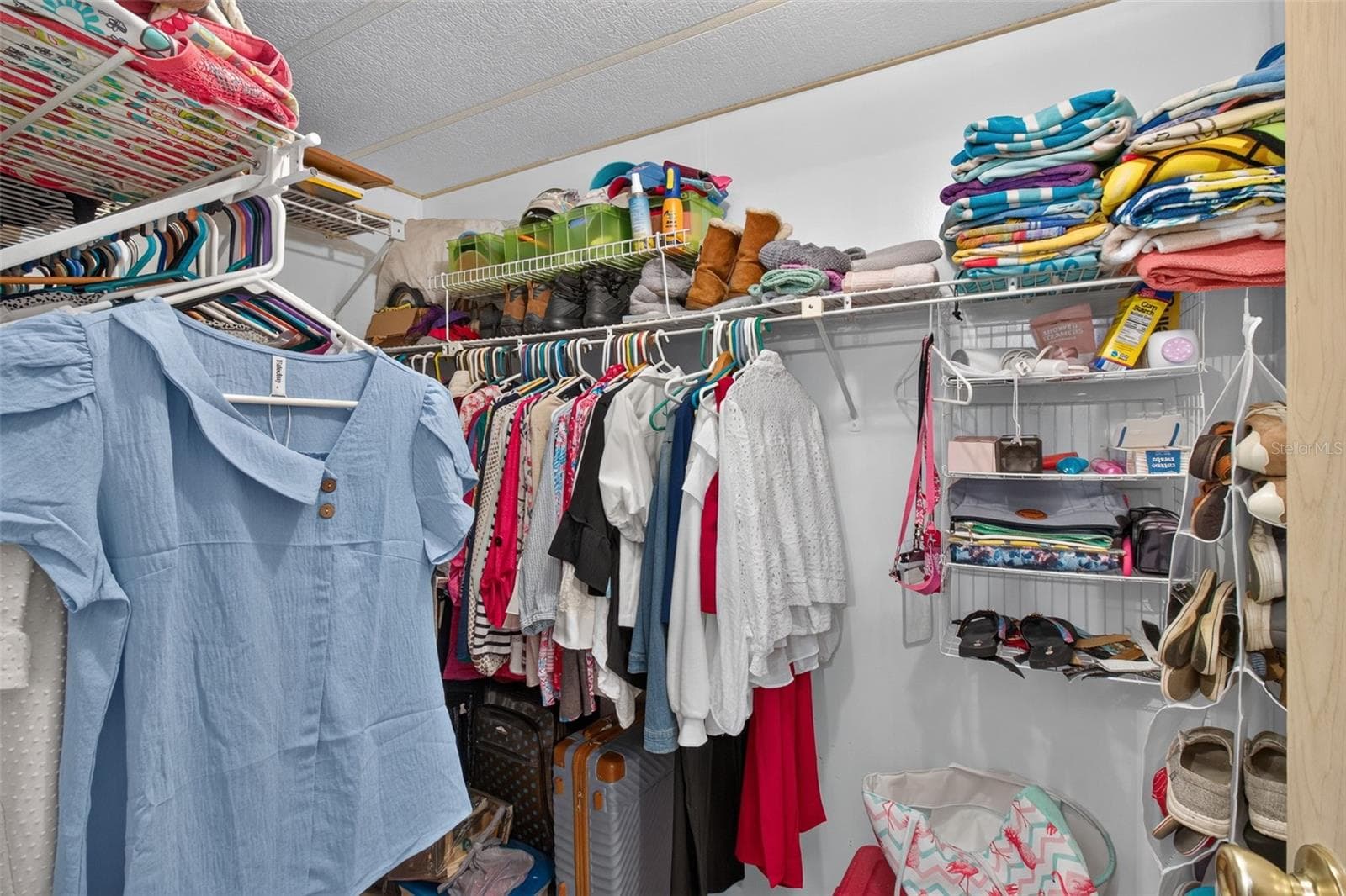 Primary walk-in closet - 176 CLUBVIEW DR #3, SAFETY HARBOR